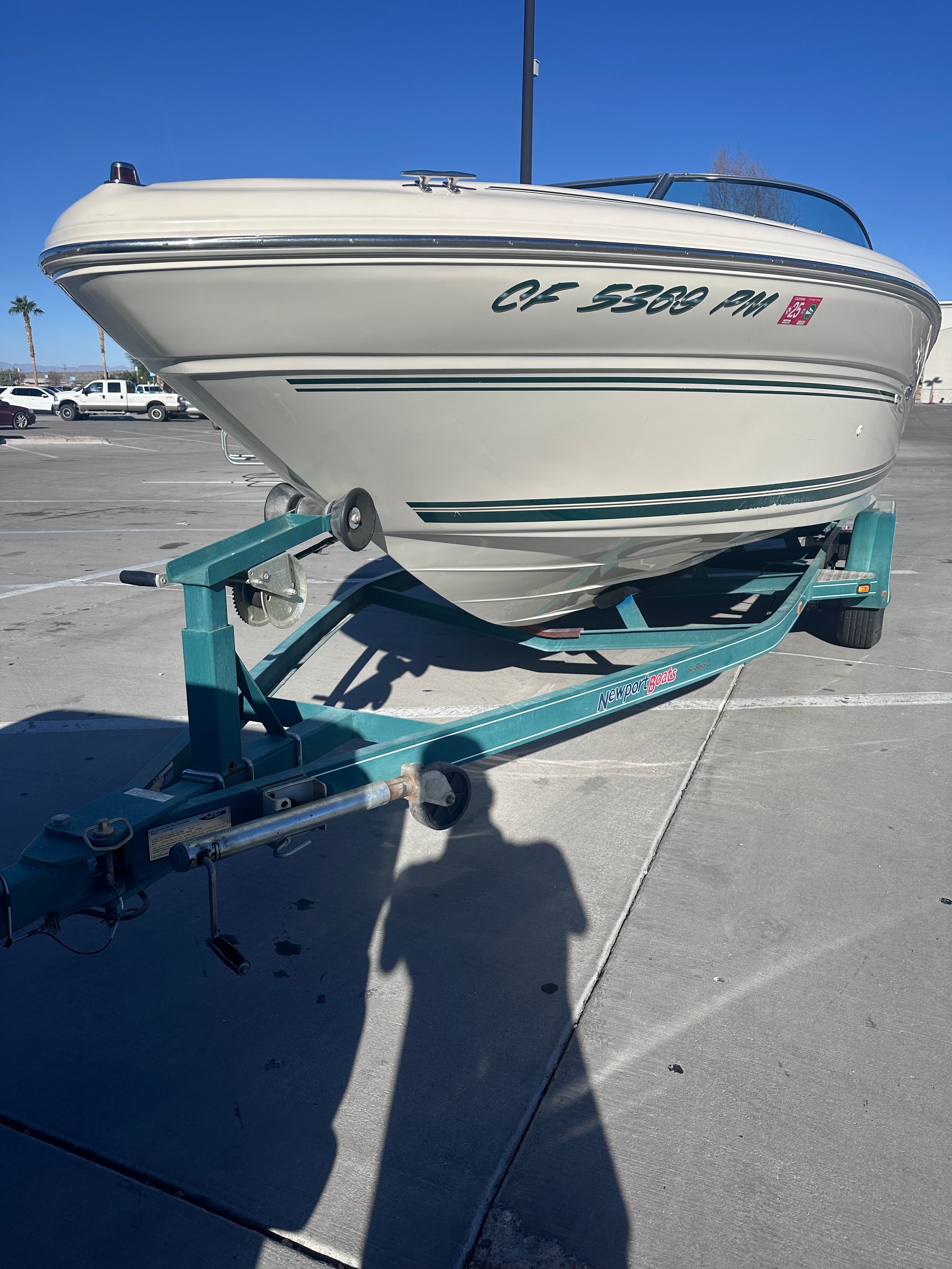 2000 Sea Ray Signature Series boat on trailer outdoors.