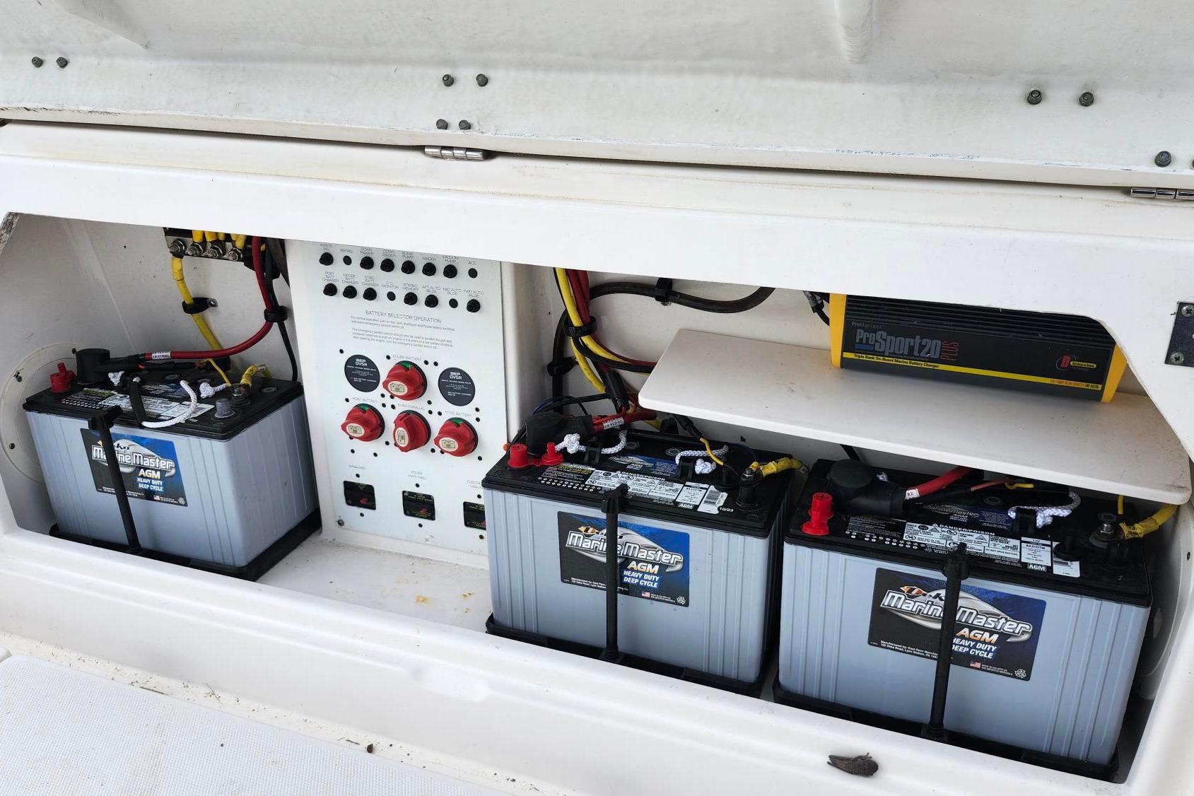 2015 Robalo R300 Center Console boat battery compartment with AGM batteries and charger.