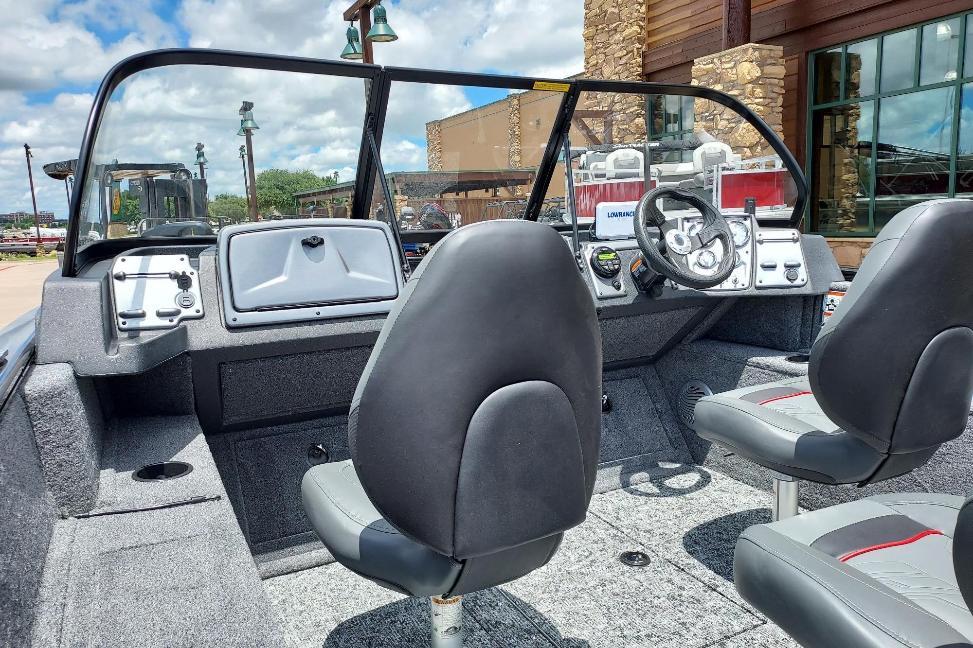 Interior of 2026 Tracker Pro Guide V-175 Combo boat with modern dashboard and seating.
