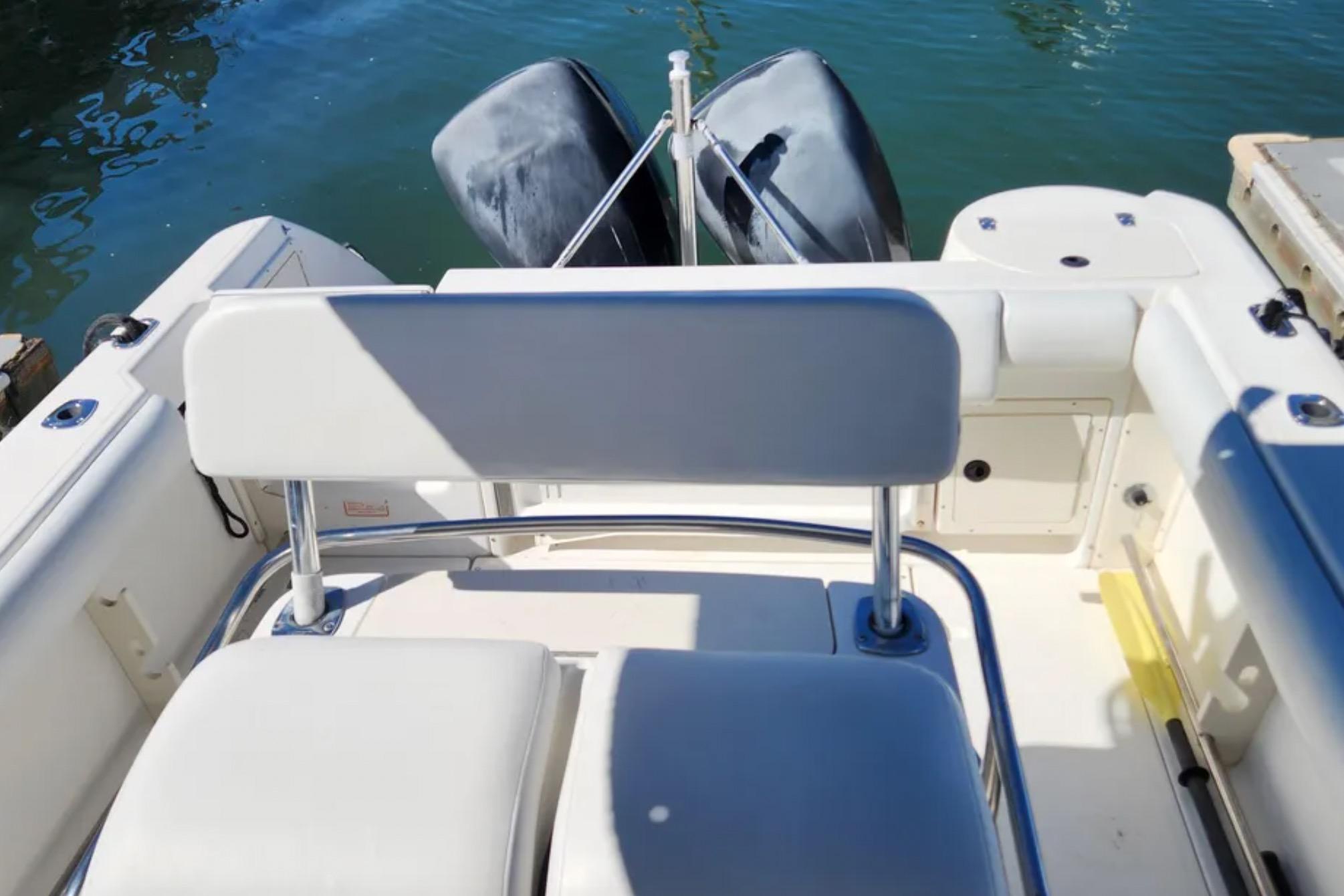 2001 Boston Whaler 26 Outrage boat interior with dual outboard motors.