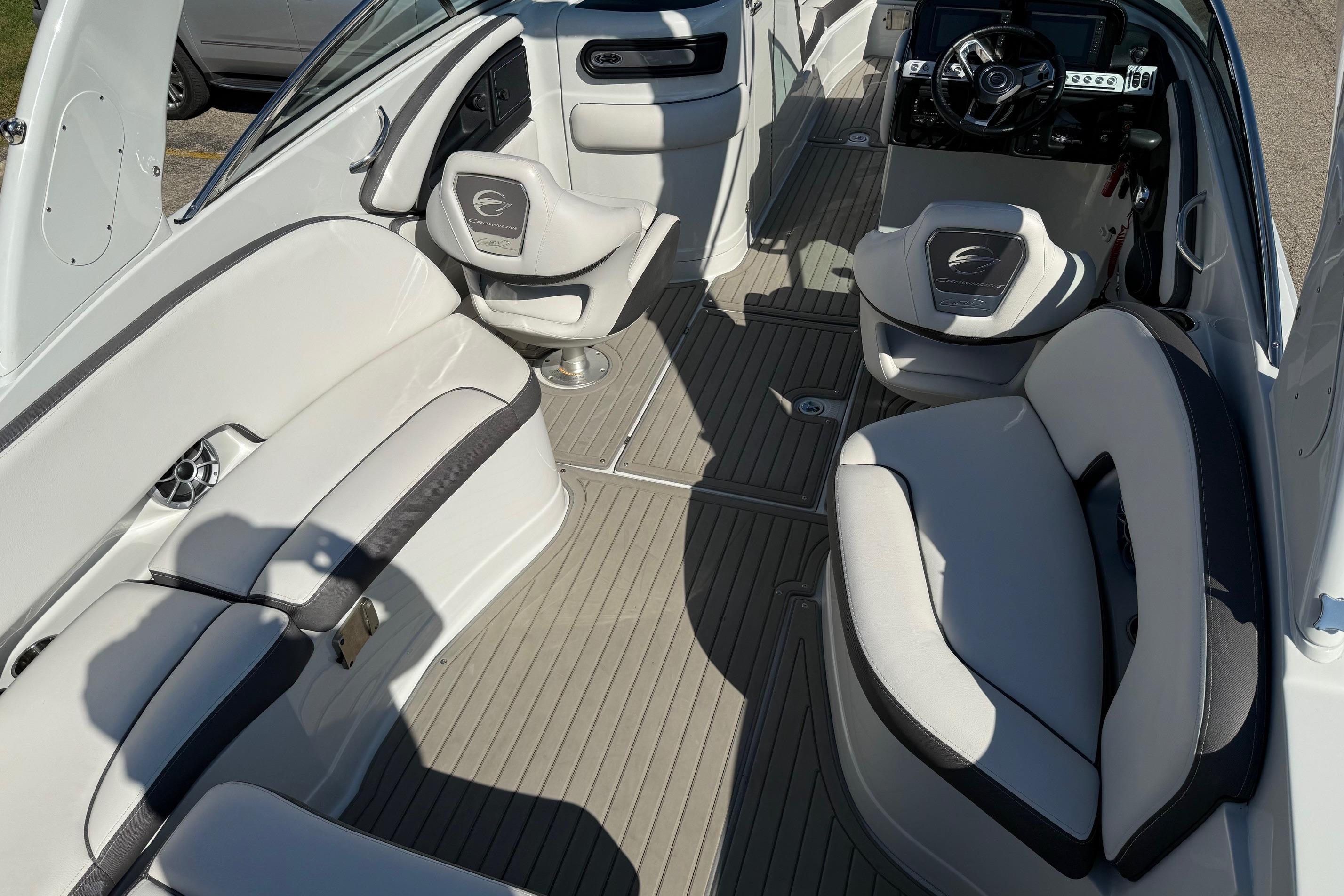 2023 Crownline 290 SS boat interior with luxurious seating and modern dashboard.