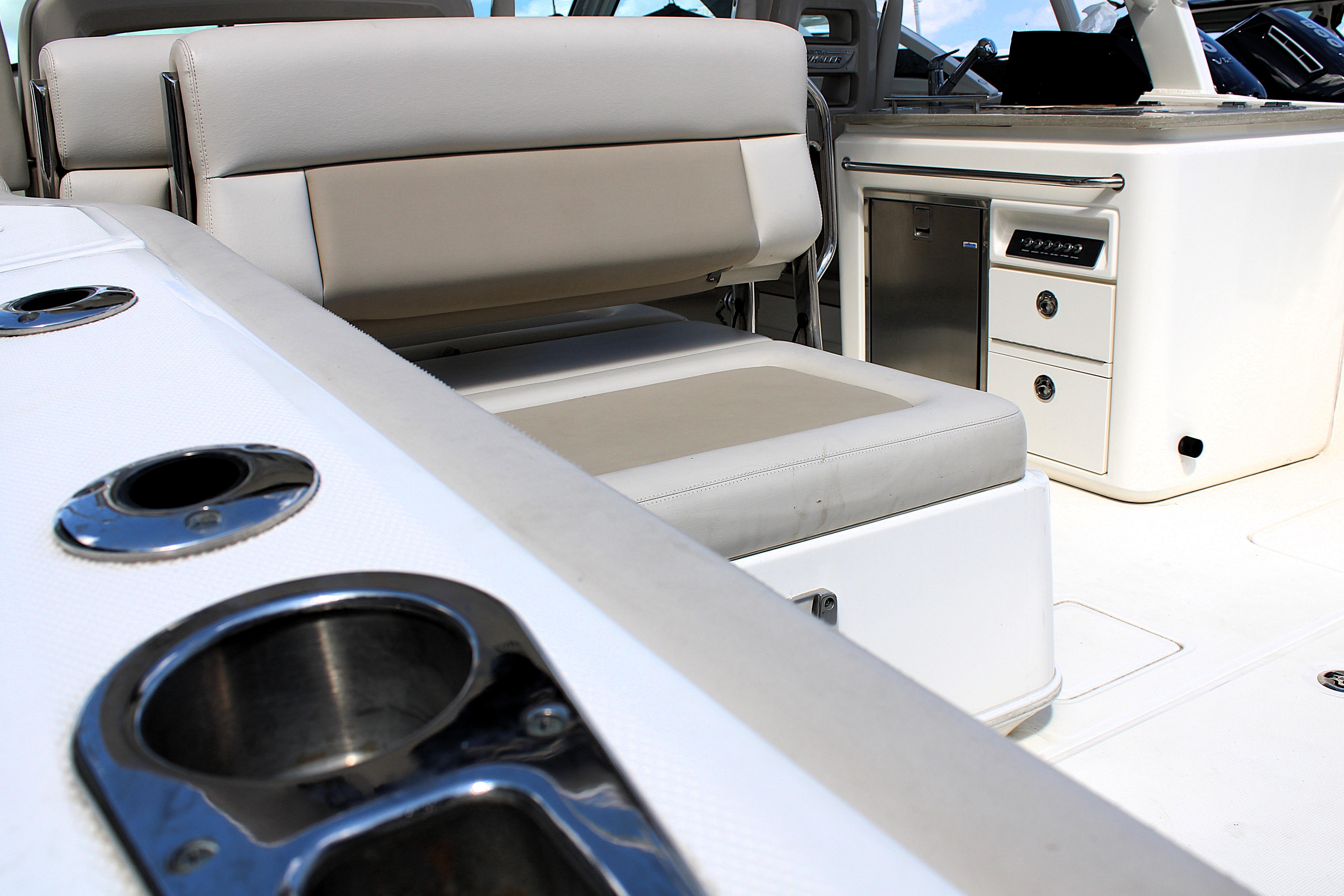 Interior of 2021 Boston Whaler 320 Vantage boat with seating and storage.