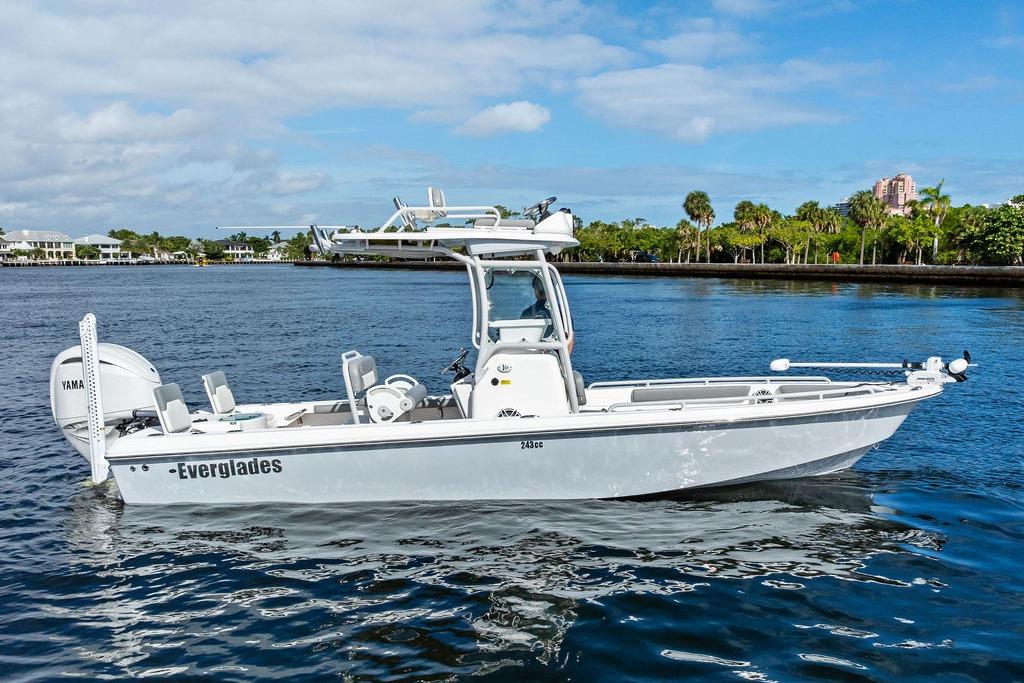 2023 Everglades 243 Center Console boat on calm water, showcasing sleek design and modern features.