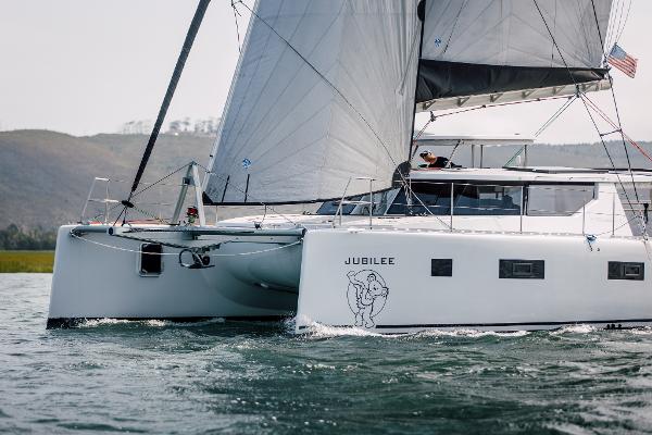 Modern Vision 444 catamaran Jubilee sailing on open water, 2025 model.