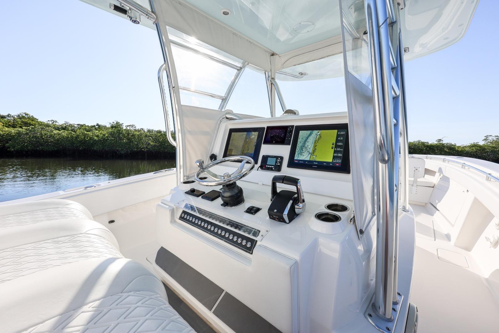 2016 Invincible 39 Open Fisherman boat cockpit with modern navigation equipment.