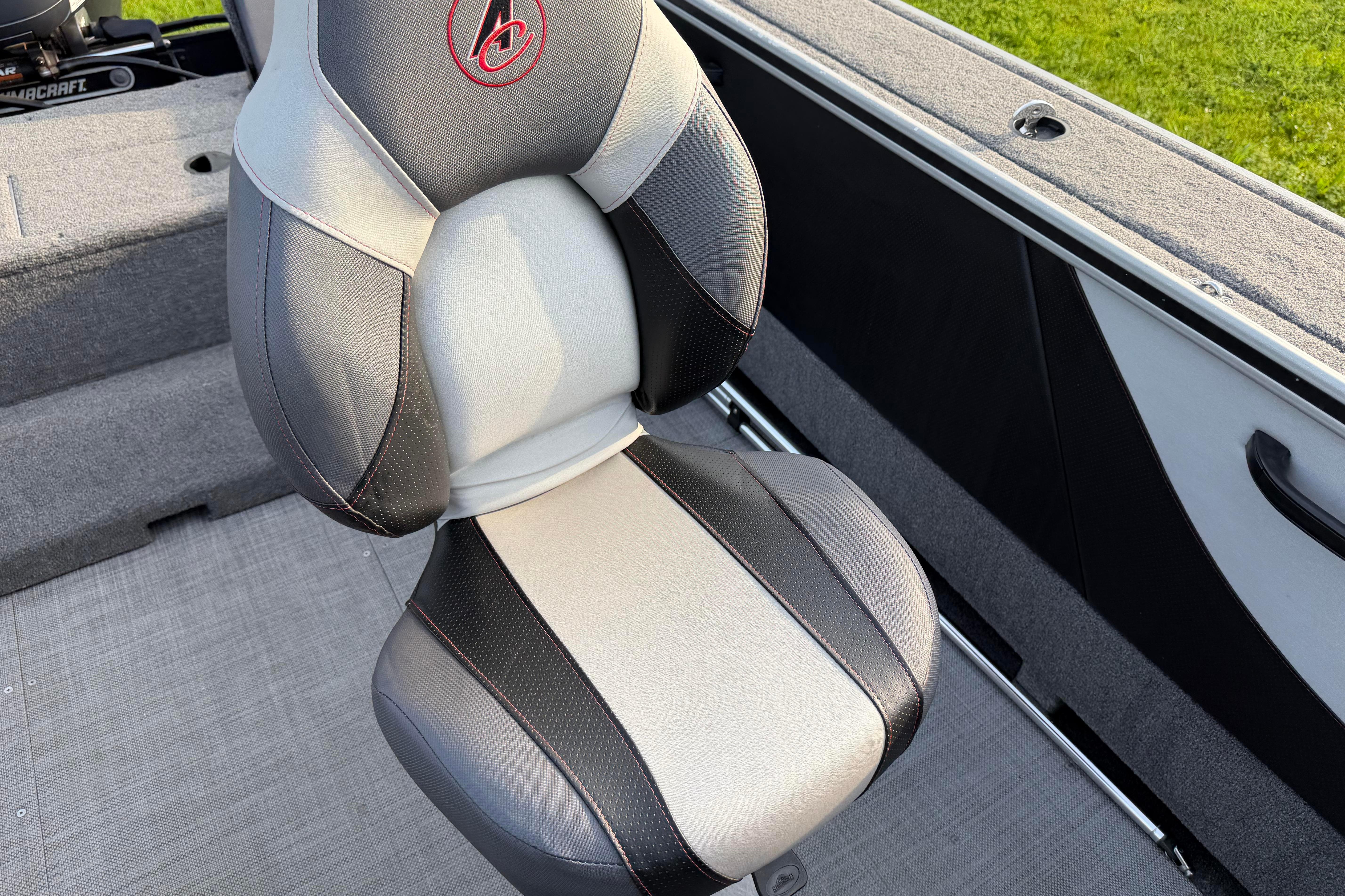2019 Alumacraft Trophy 205 boat seat, featuring sleek black and gray design.
