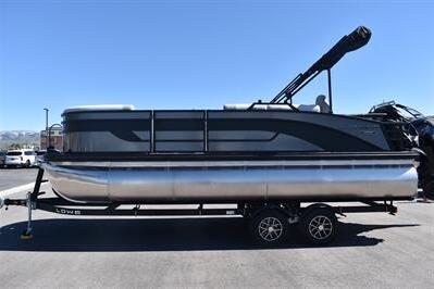 2026 Lowe SF 212 Sport Fish pontoon boat on trailer, side view, clear sky background.