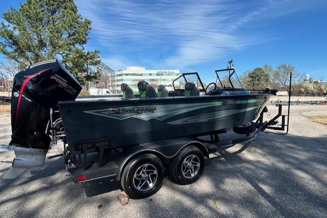 2025 Ranger VX1988 WT boat on trailer, parked outdoors under clear sky.