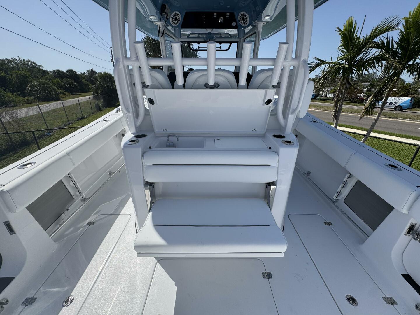 2025 Sportsman 352 Open boat interior with seating and console, featuring sleek white design.