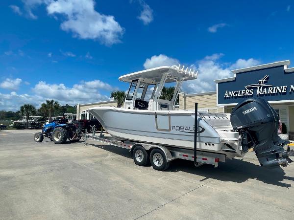 2023 Robalo R270 boat on trailer at Anglers Marine dealership.