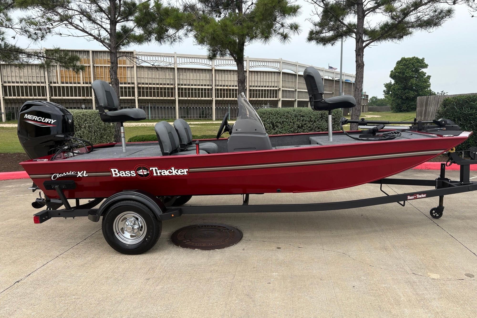 2026 Tracker Bass Tracker Classic XL boat on trailer, parked outdoors.