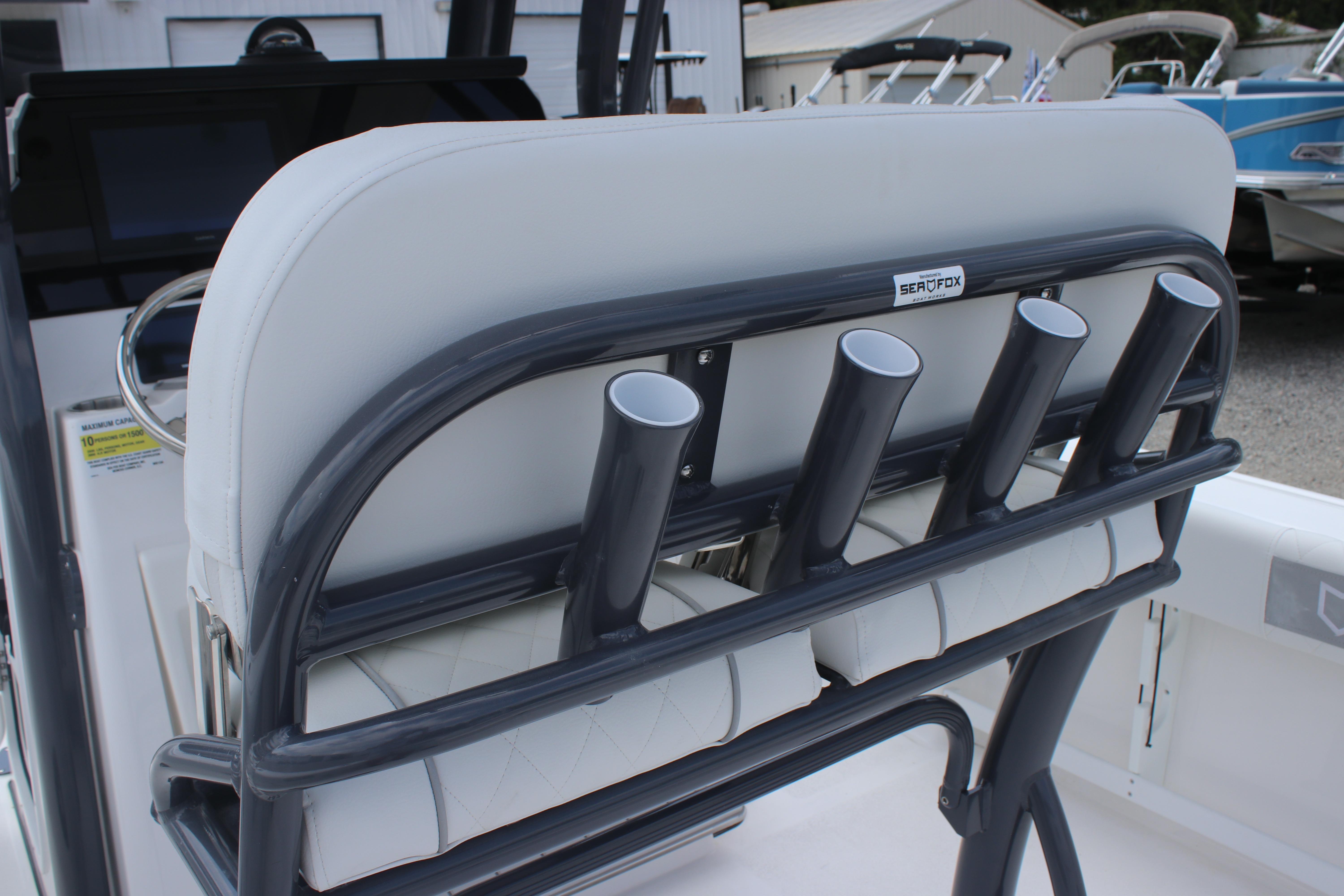 2026 Sea Fox 248 Commander boat seat with rod holders, featuring sleek design and durable materials.