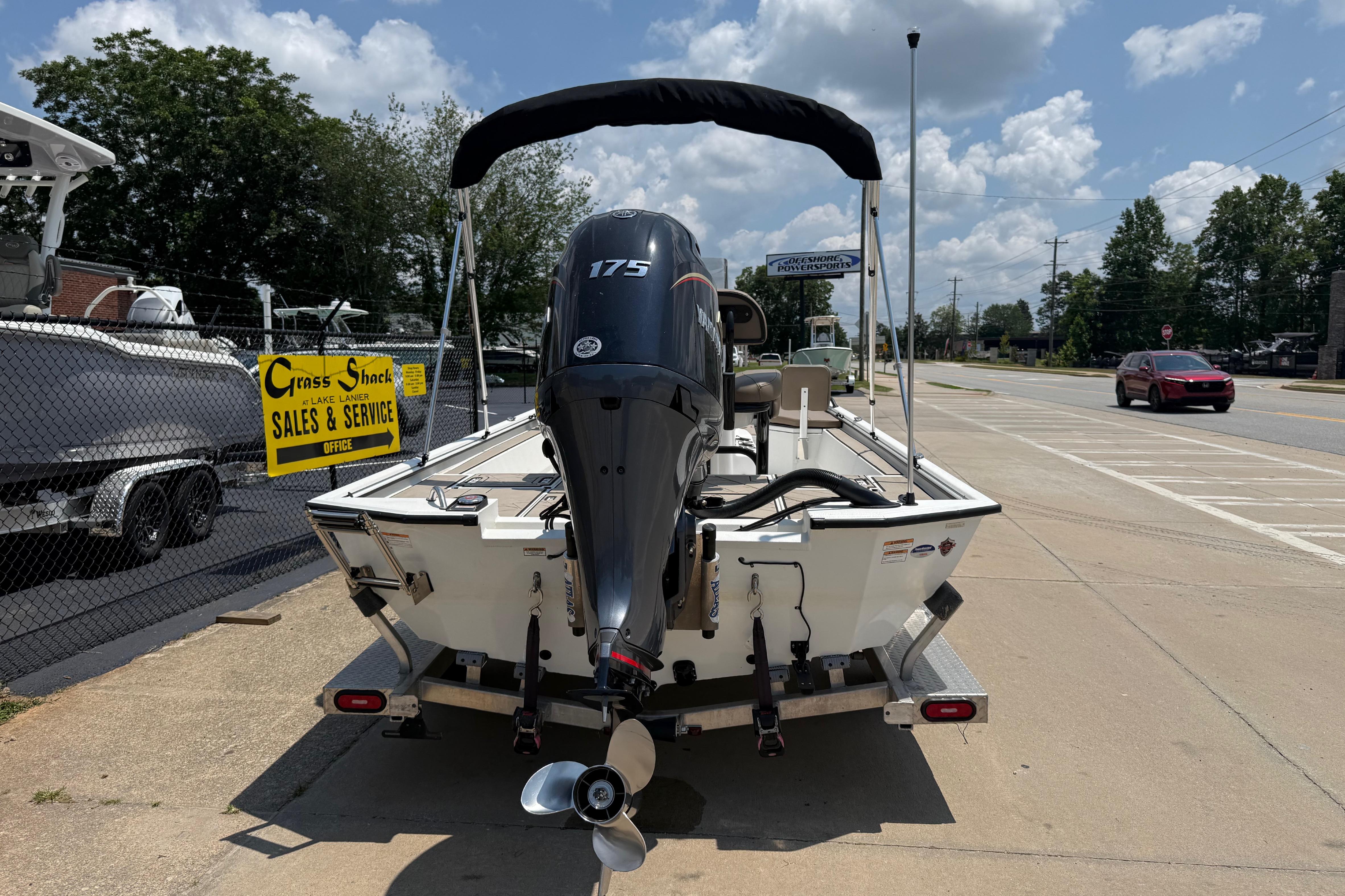 Avid 22 Recon 2025 boat with 175 HP engine at sales and service center.