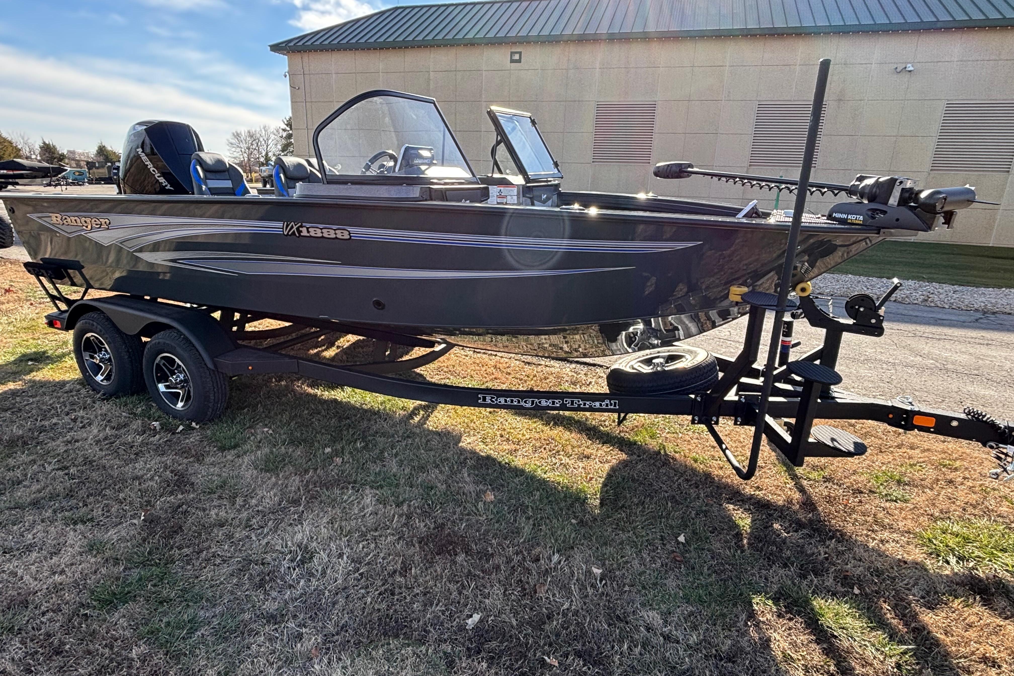 2026 Ranger VX1888 WT boat on trailer, parked outdoors, side view.