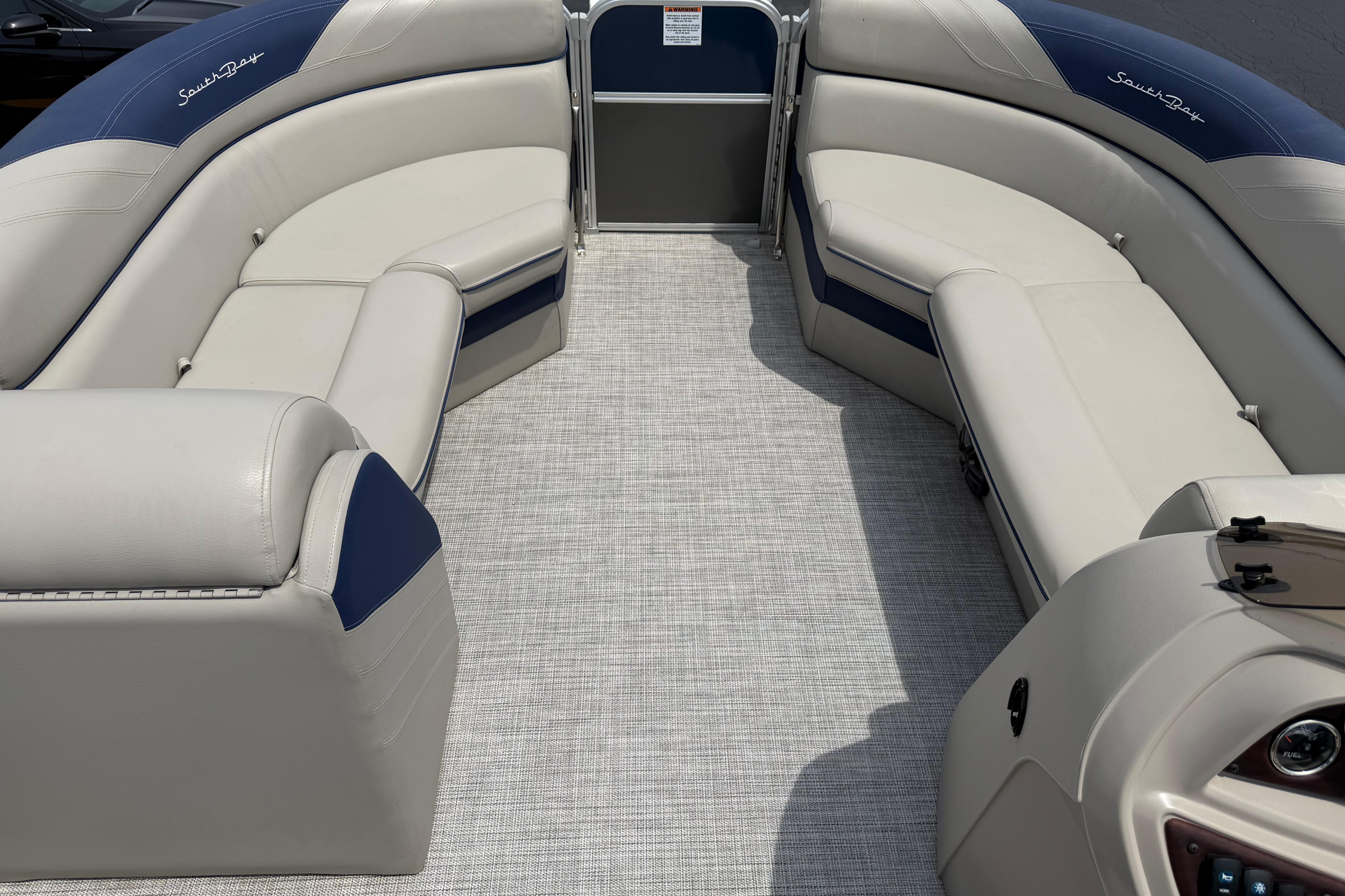 2021 South Bay 224RS LE pontoon boat interior with plush seating and modern design.