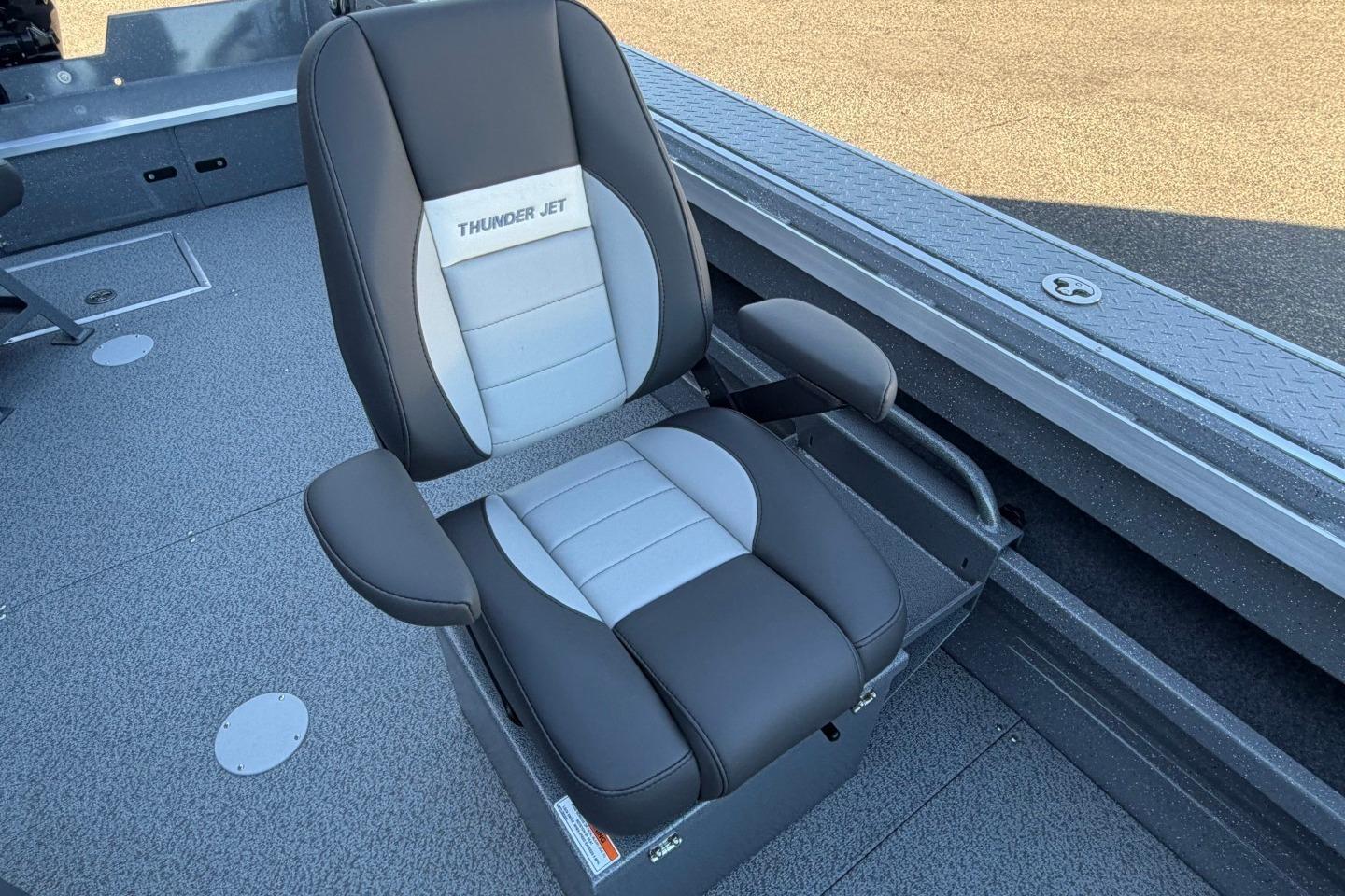 Captain's chair in 2026 Thunder Jet 209 Rush OT boat, featuring sleek black and gray design.