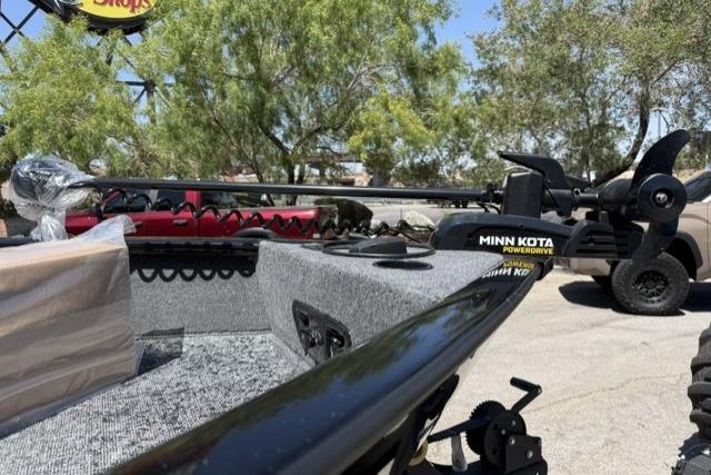 2026 Tracker Pro Guide V-175 WT boat with Minn Kota motor in outdoor setting.