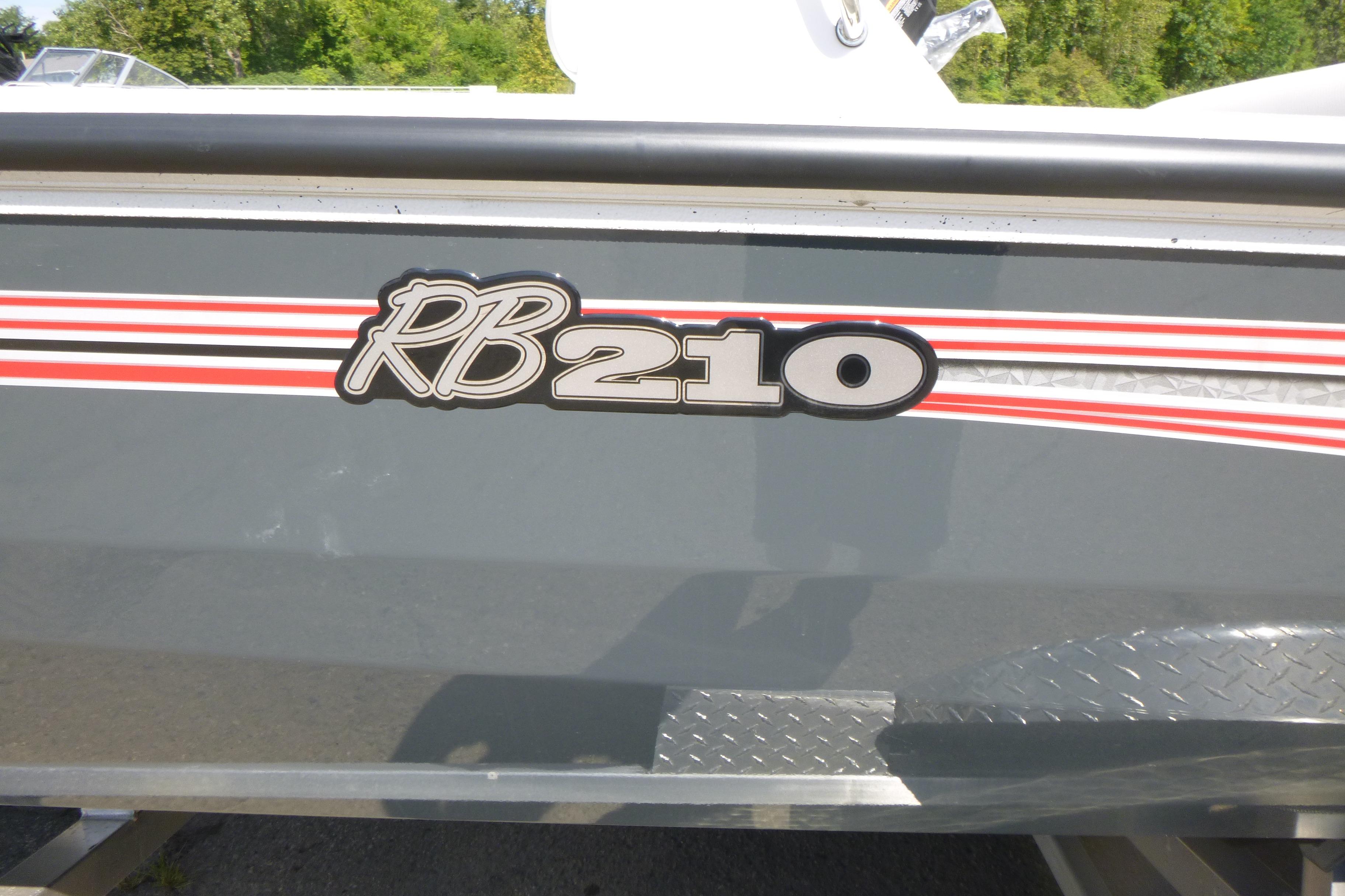 2025 Ranger RB210 boat with red and white stripes on gray hull.