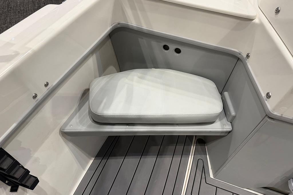 Interior seating of 2027 Arima Sea Ranger 21 Hardtop boat, featuring cushioned bench.