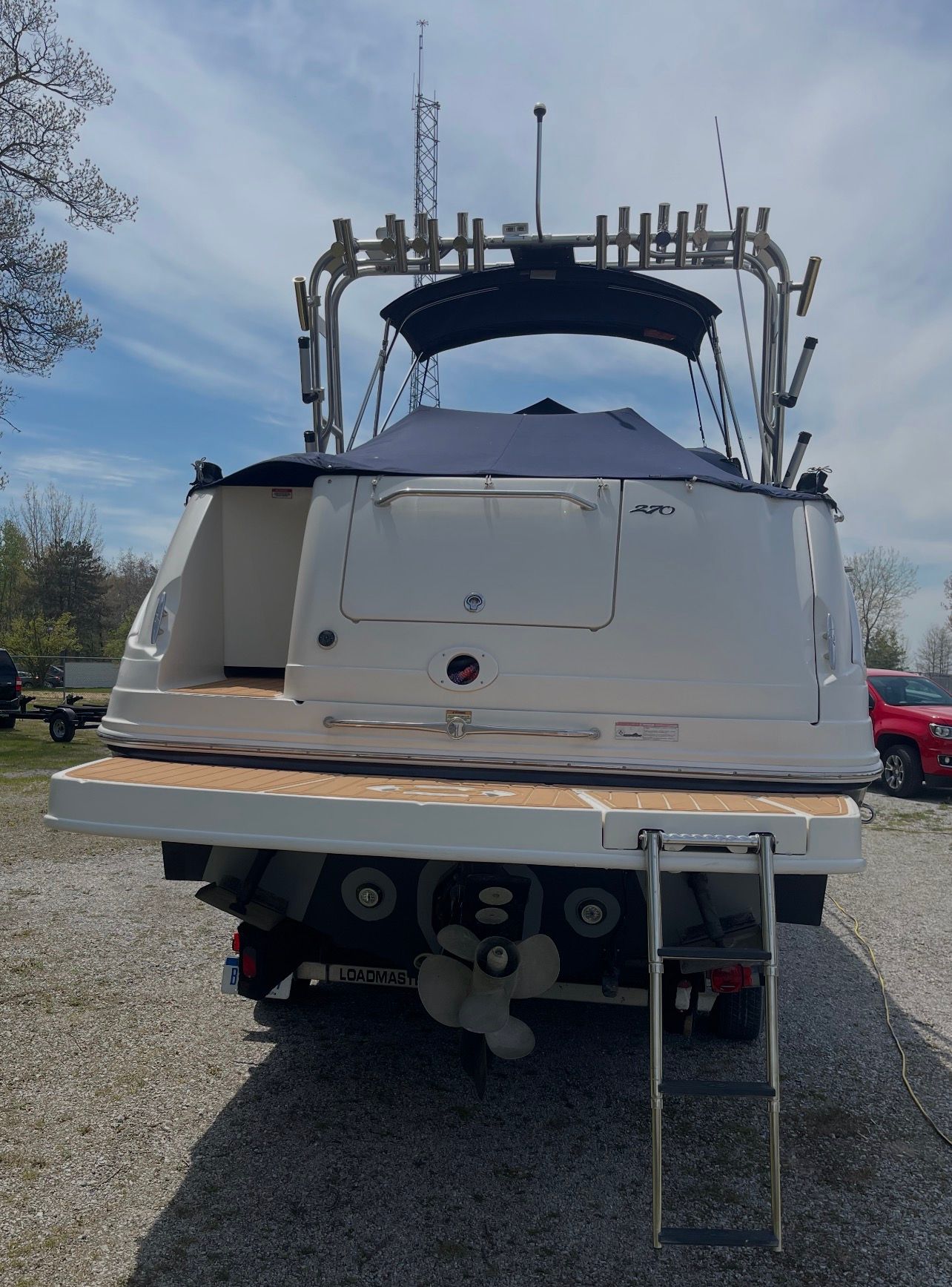 Rear view of a 2006 Sea Ray 270 Amberjack on a trailer.