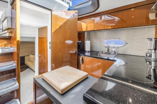 Interior of 2013 Princess V57 yacht featuring modern kitchen.