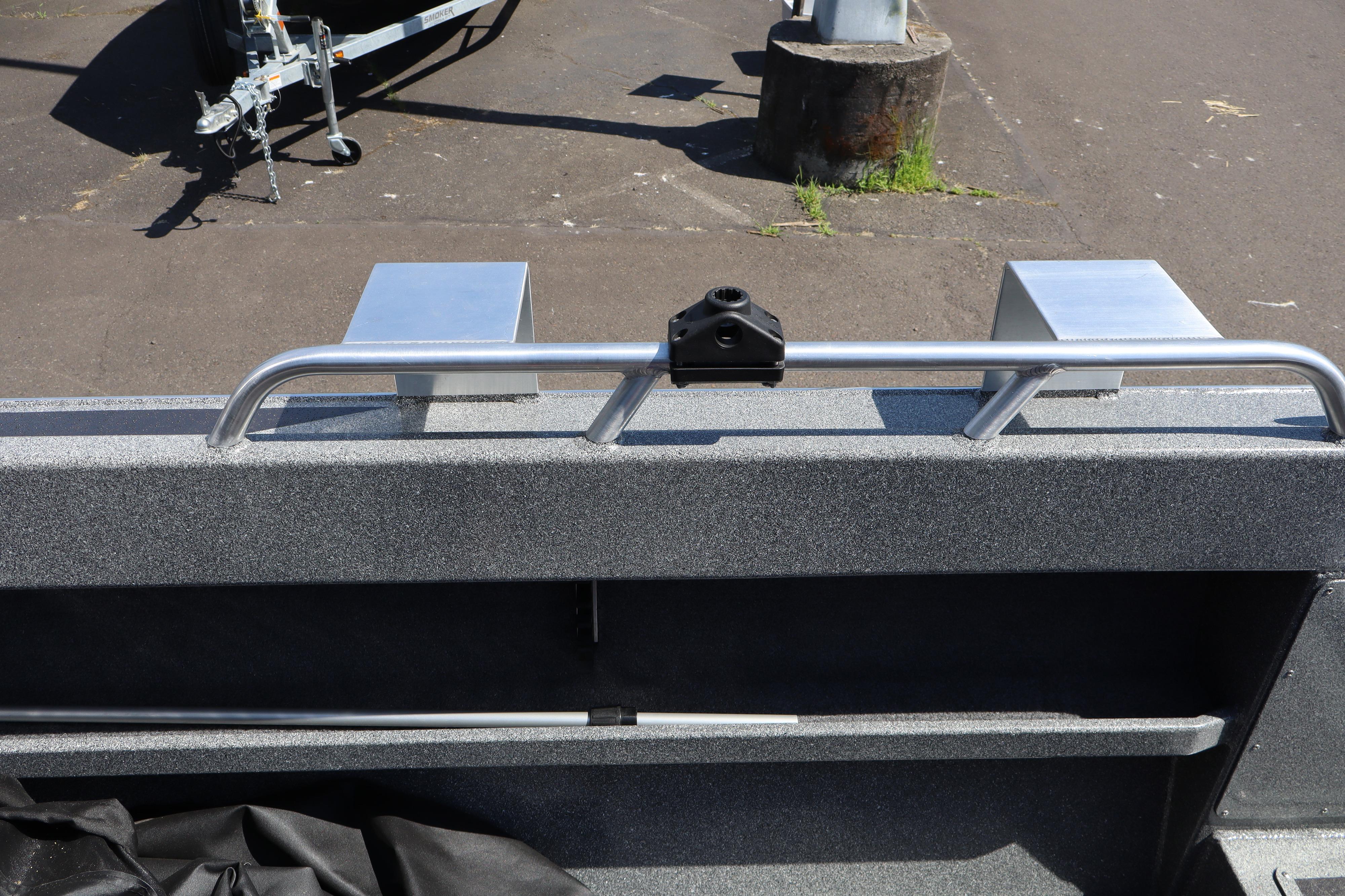 2025 NorthRiver SEAHAWK boat detail with metal railing and trailer in background.