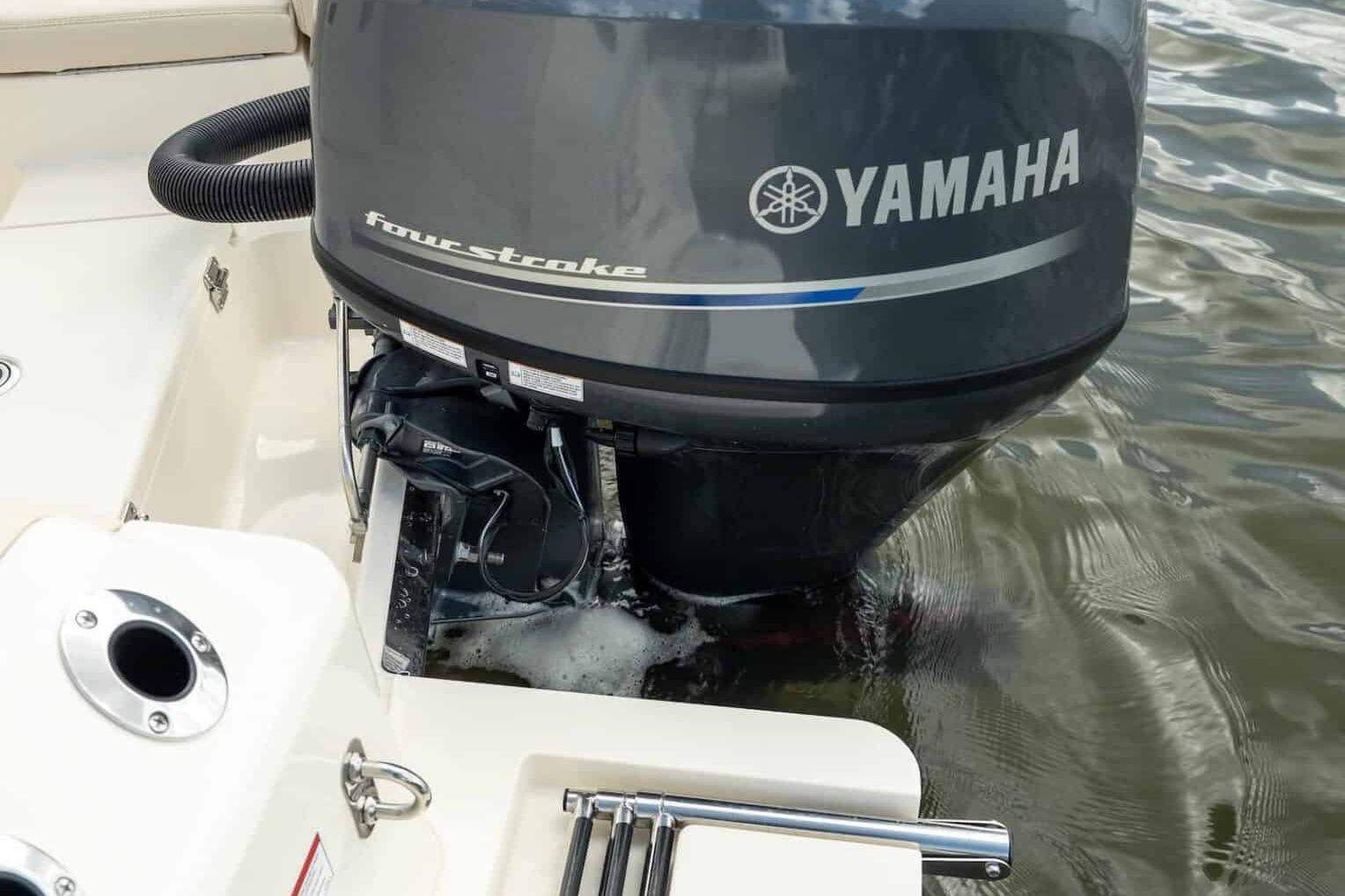 2026 Scout 188 Sportfish with Yamaha four-stroke outboard engine on water.