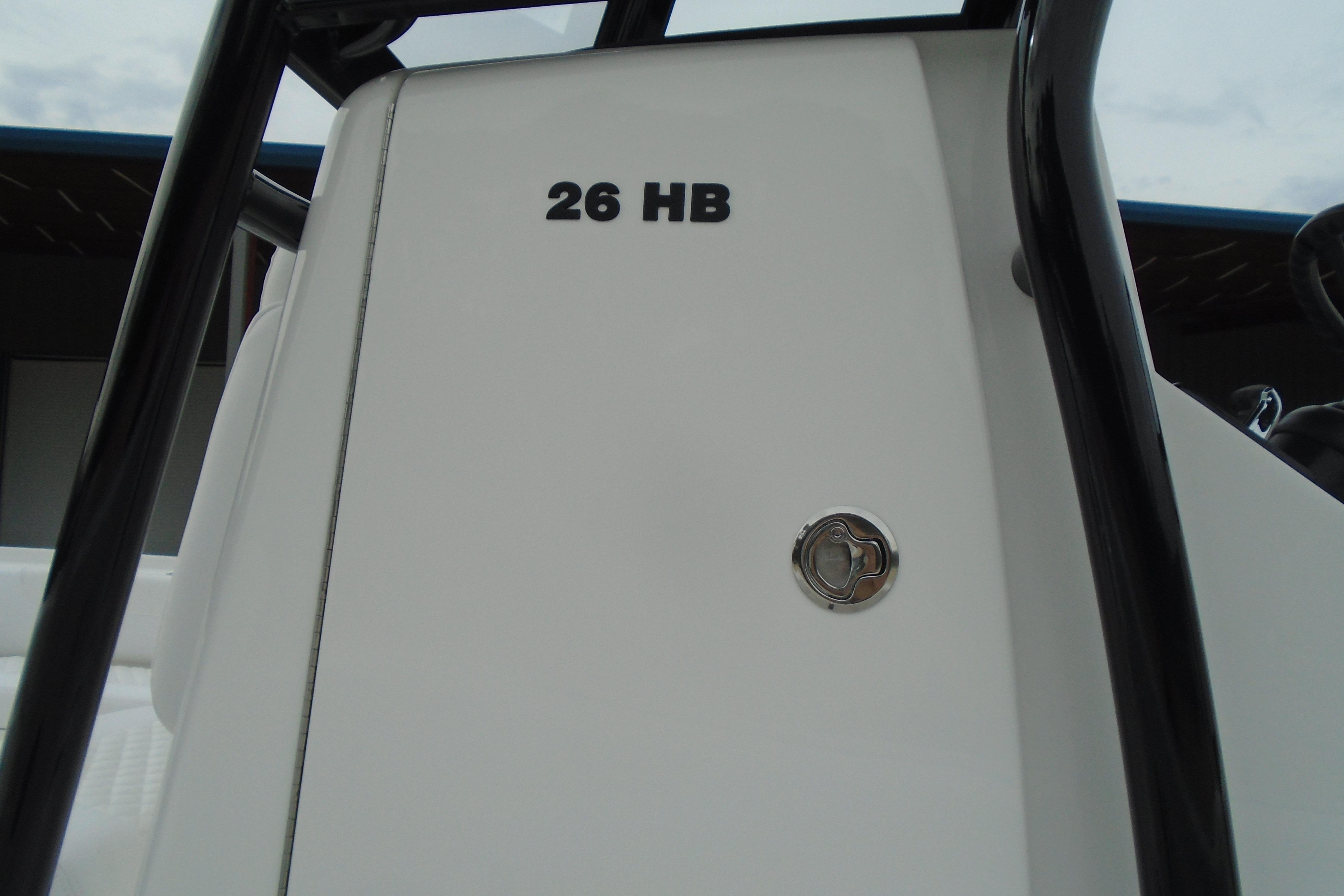 2026 Caymas 26 HB boat console with black frame and sleek design.