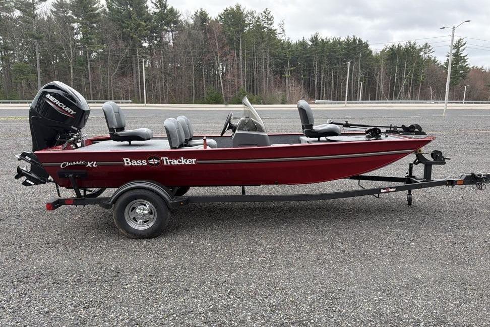 2026 Tracker Bass Tracker Classic XL boat on trailer, parked outdoors.
