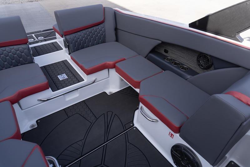 Interior of 2026 Scarab 255 LX Wake boat with gray and red seating.