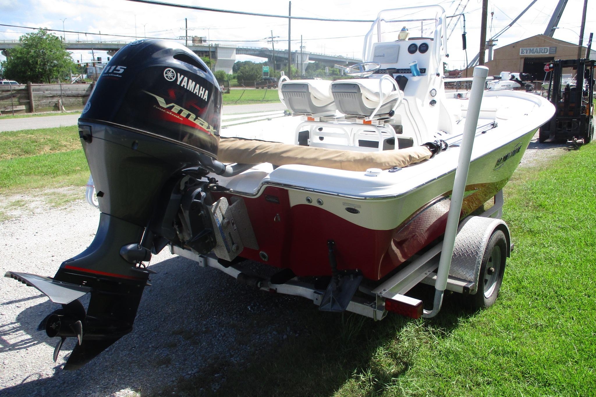 2021 Blue Wave 2000 PureBay boat with Yamaha outboard motor on trailer.