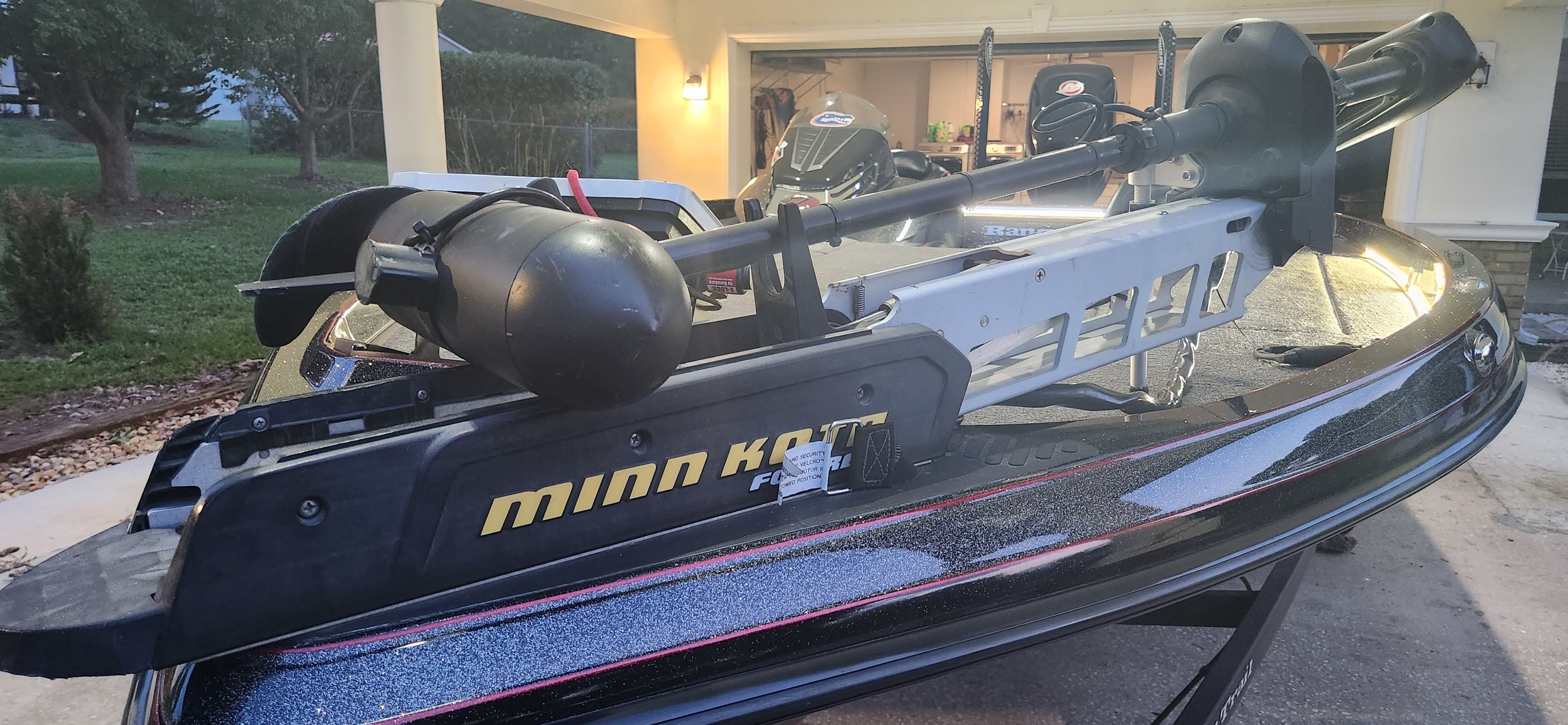 A 2017 Ranger Z520 Comanche with a Minn Kota trolling motor, parked in a driveway.