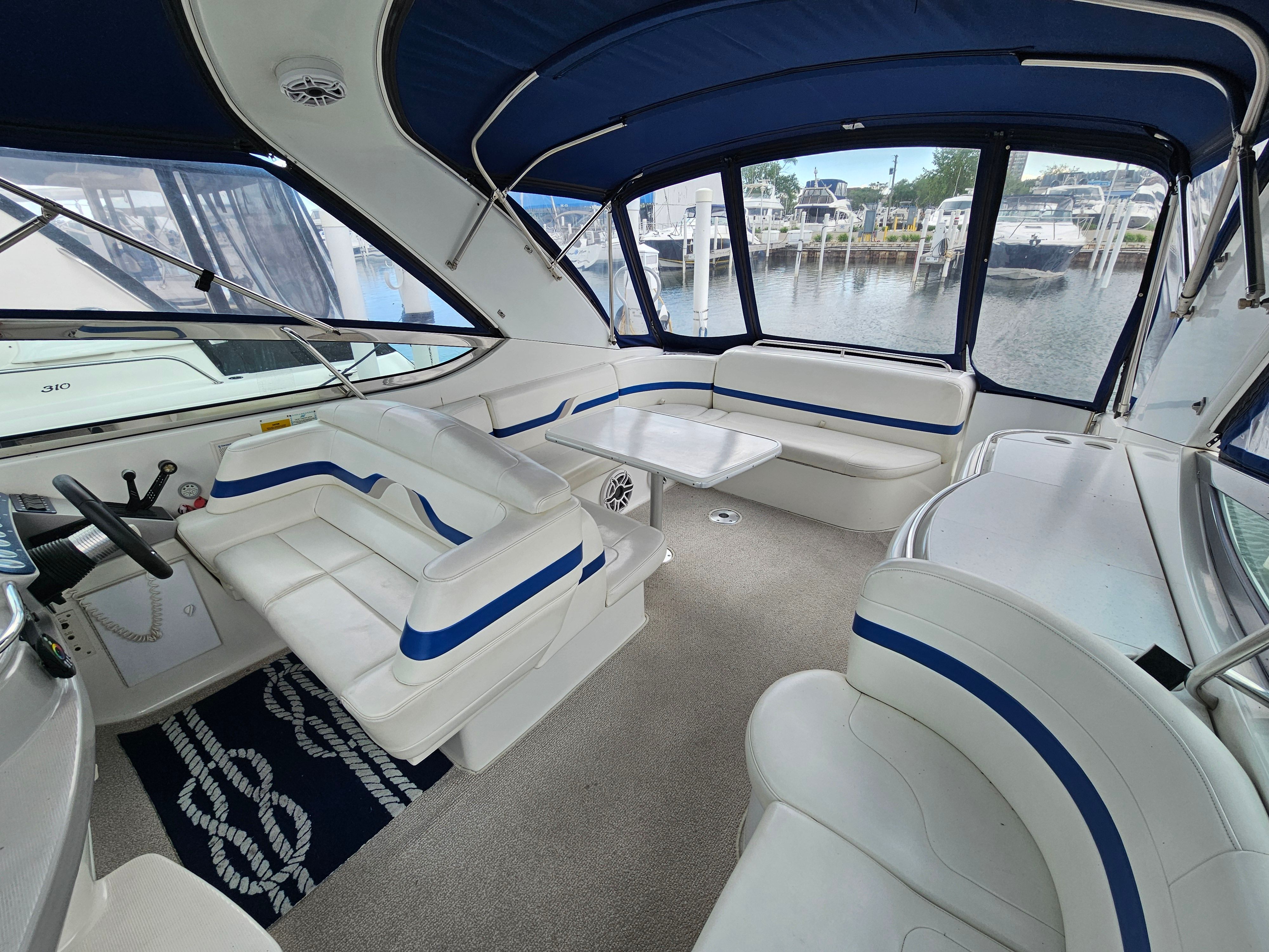 Interior of a 2001 Formula 400 Super Sport with blue and white seating.