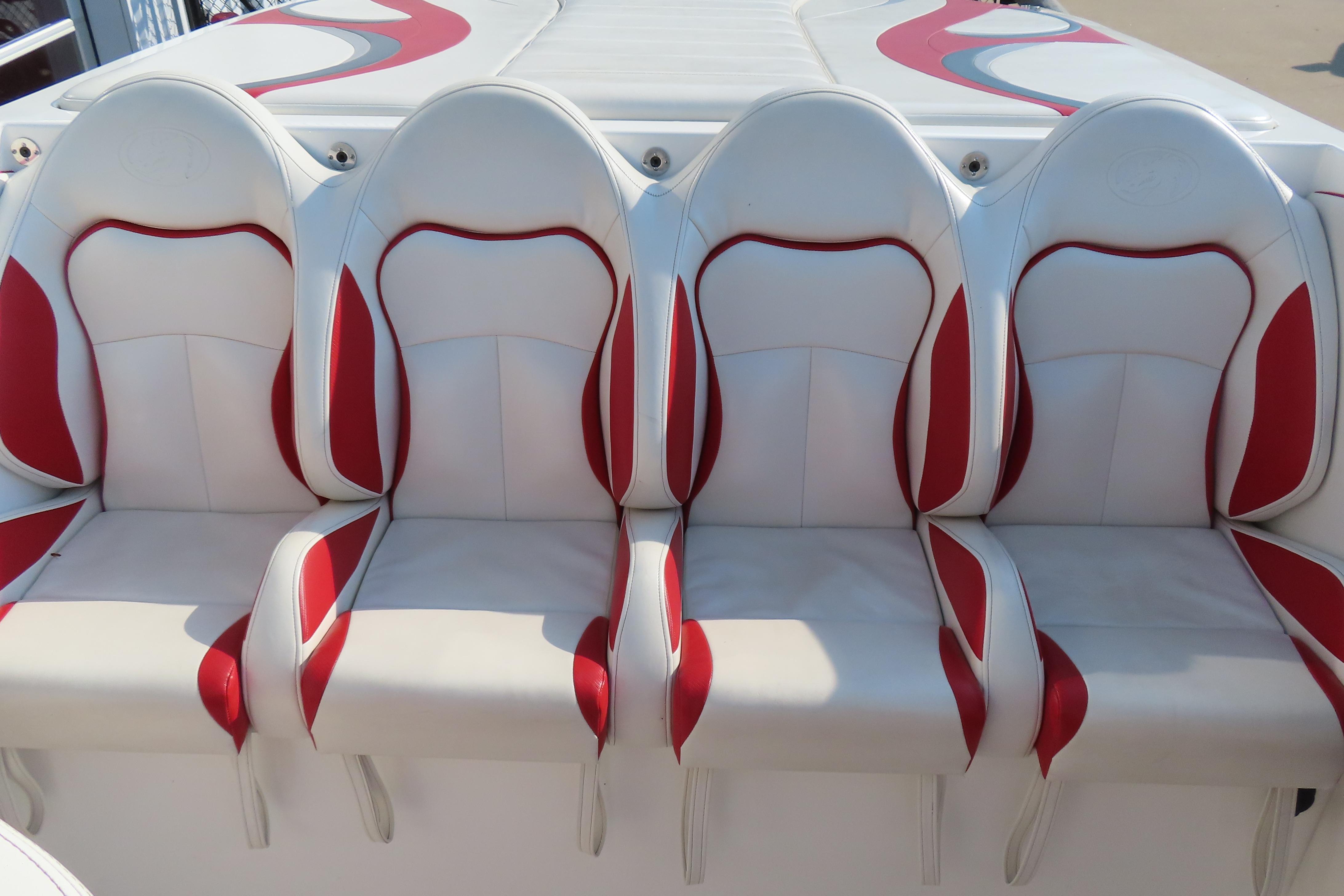 2013 Nordic 39 POKER RUN boat seats, white and red design, four seats in a row.