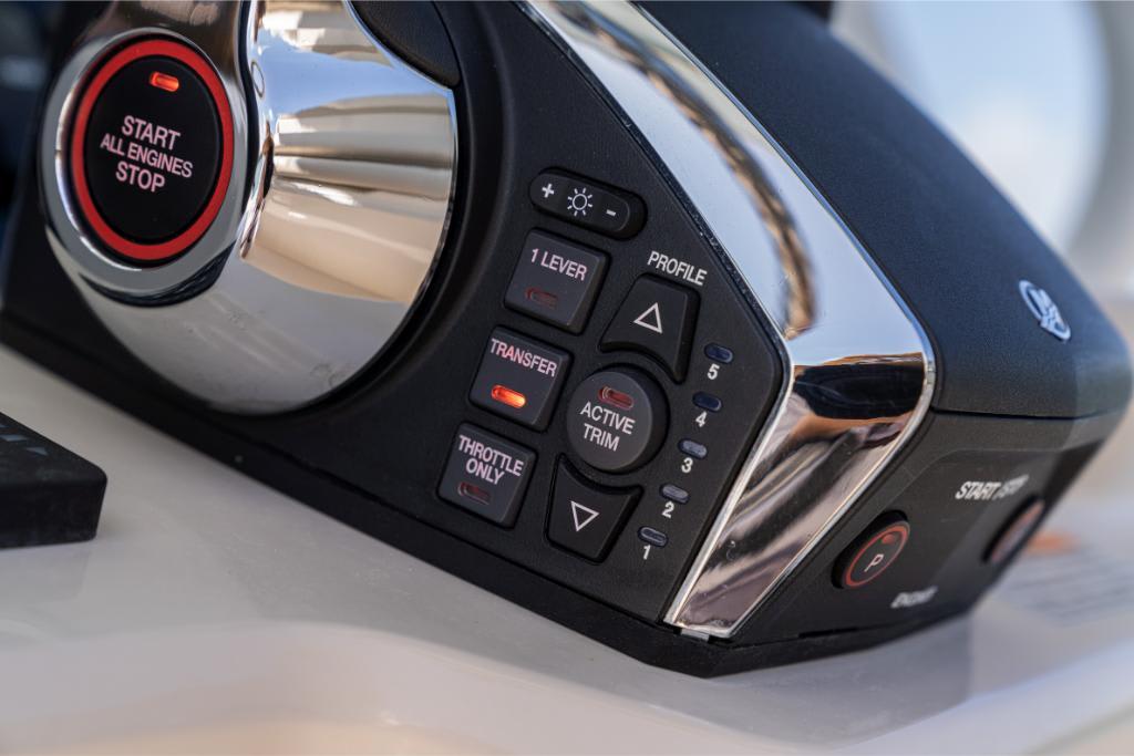 Close-up of 2024 Boston Whaler 280 Dauntless engine control panel.