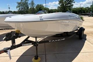 2026 Tahoe T16 boat on trailer in sunny outdoor setting.