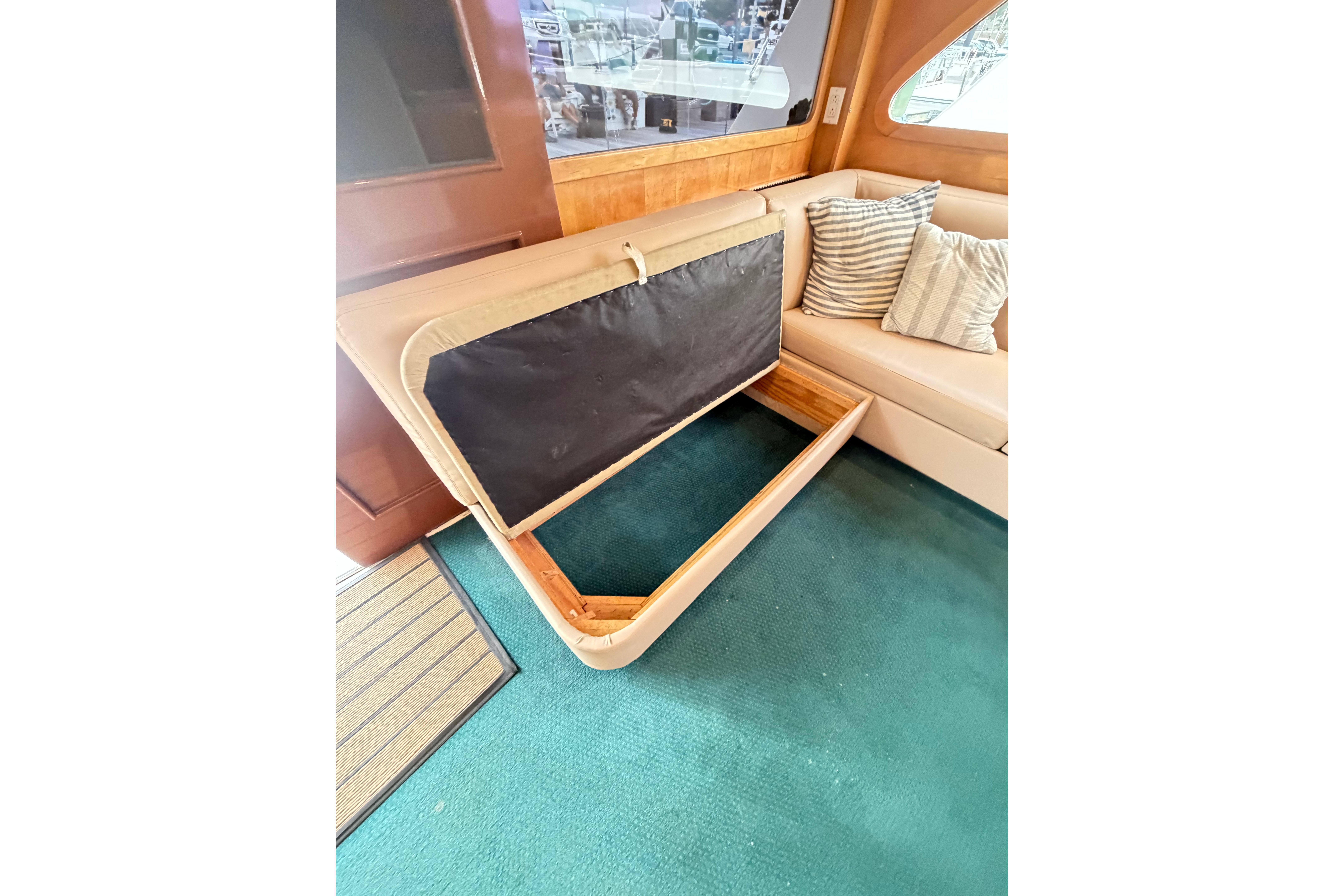 Interior of 1998 Blackwell Custom Carolina Sportfish with open storage under seating.