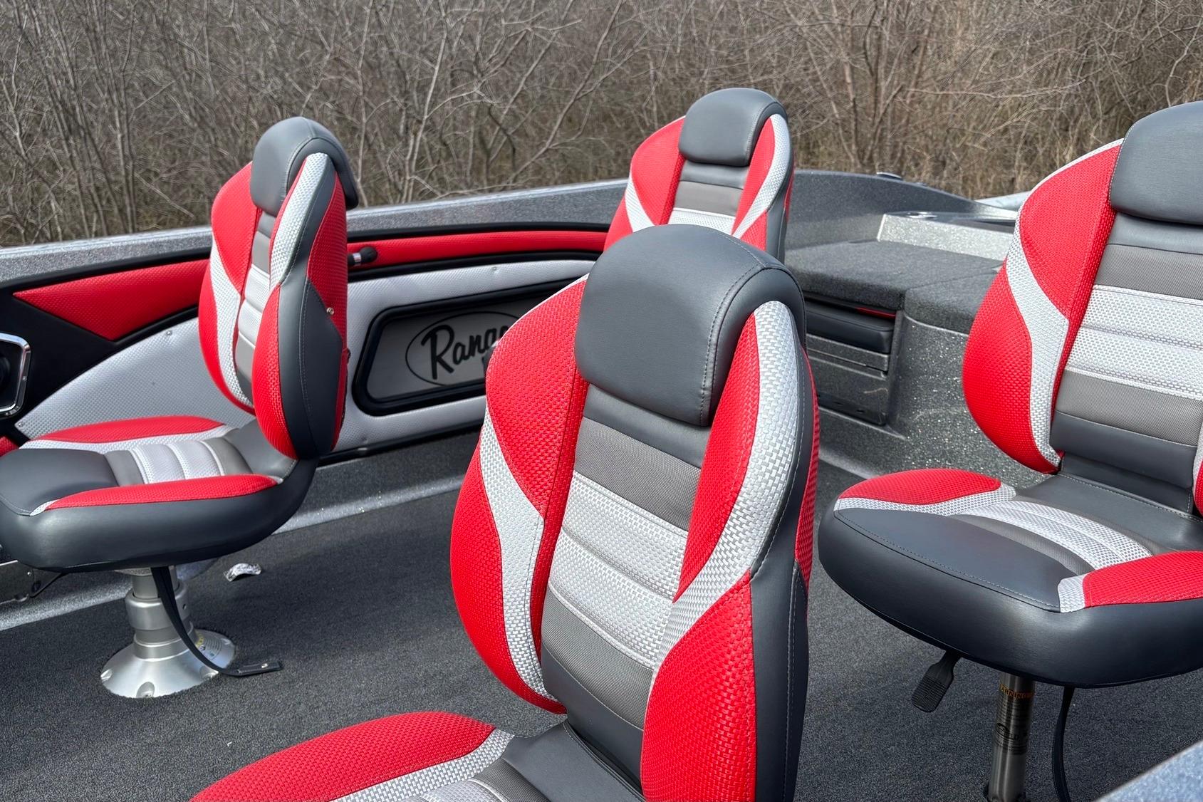 2025 Ranger 2050MS boat interior with red and gray seating, showcasing modern design.