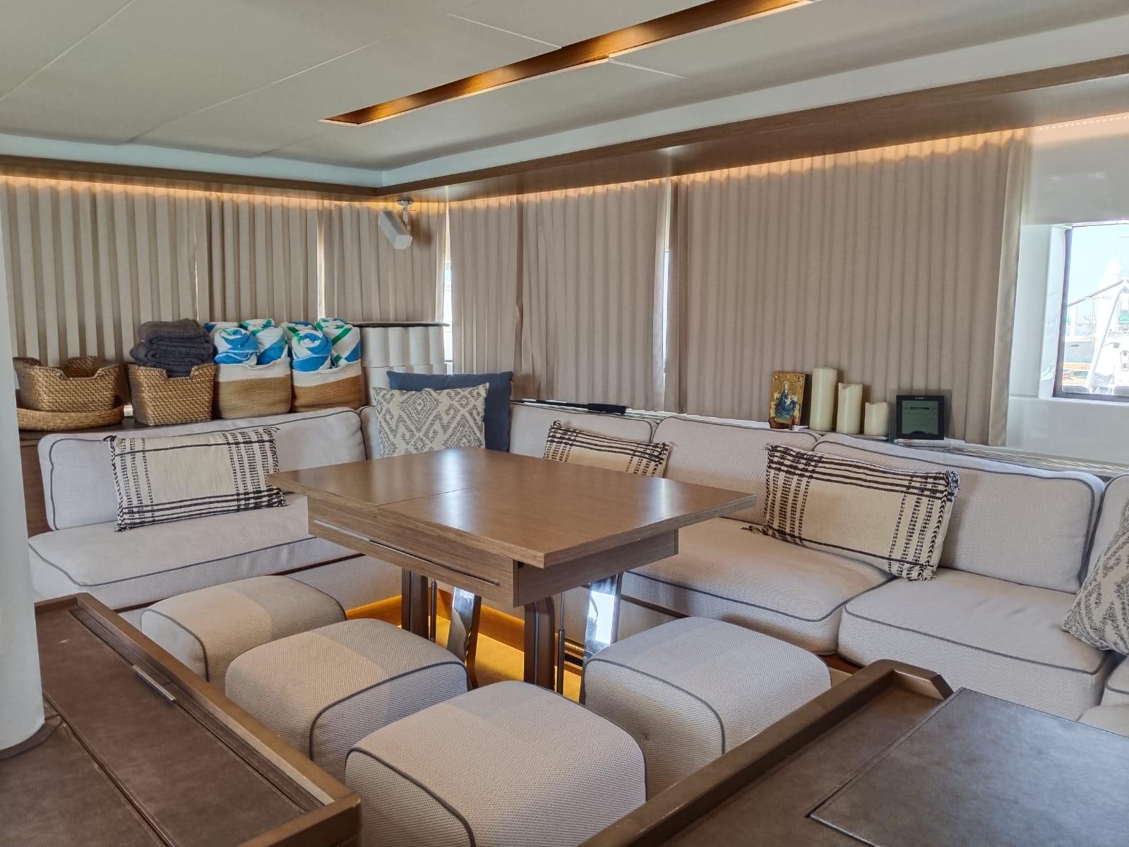 Luxurious interior of a 2018 Lagoon 50 yacht with elegant seating and decor.