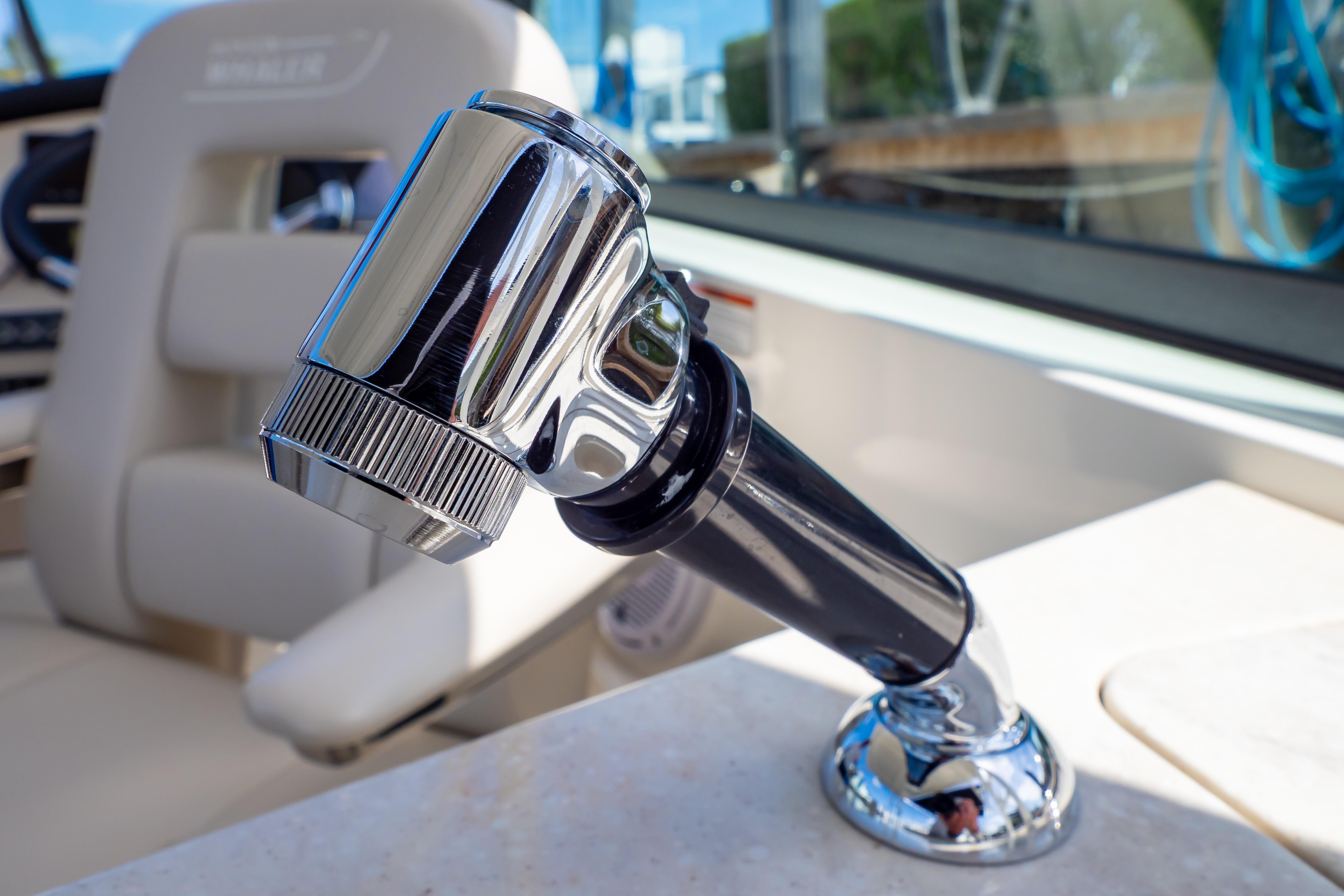 Close-up of a chrome faucet on a 2019 Boston Whaler 270 Vantage boat.
