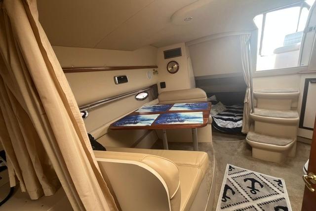 Interior of 2004 Cruisers Yachts 3372 Express with seating and table.