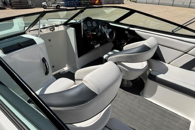 2014 Yamaha Boats 212X interior with sleek seating and modern dashboard design.