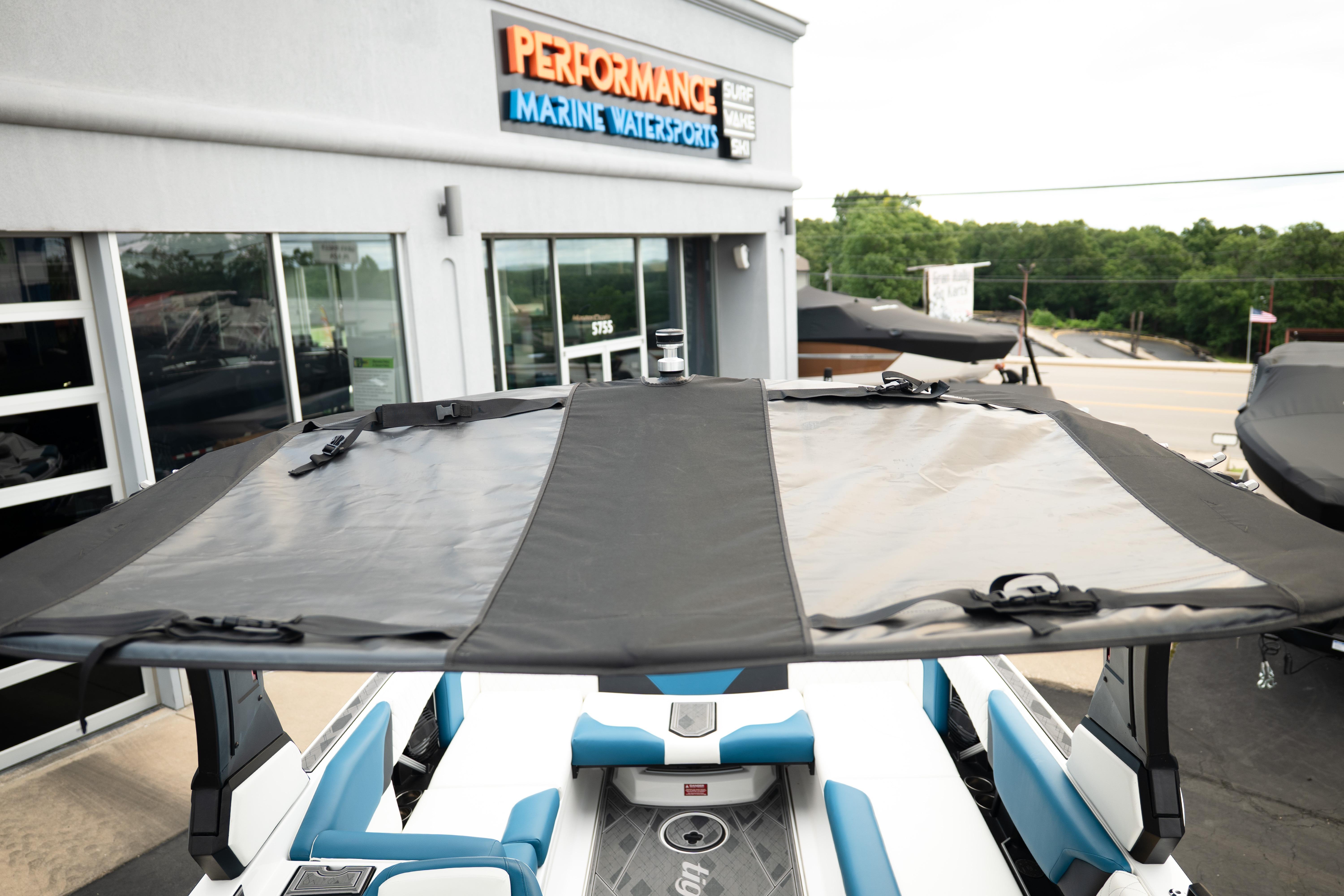 2024 Tigé Z5 boat with canopy at Performance Marine Watersports dealership.