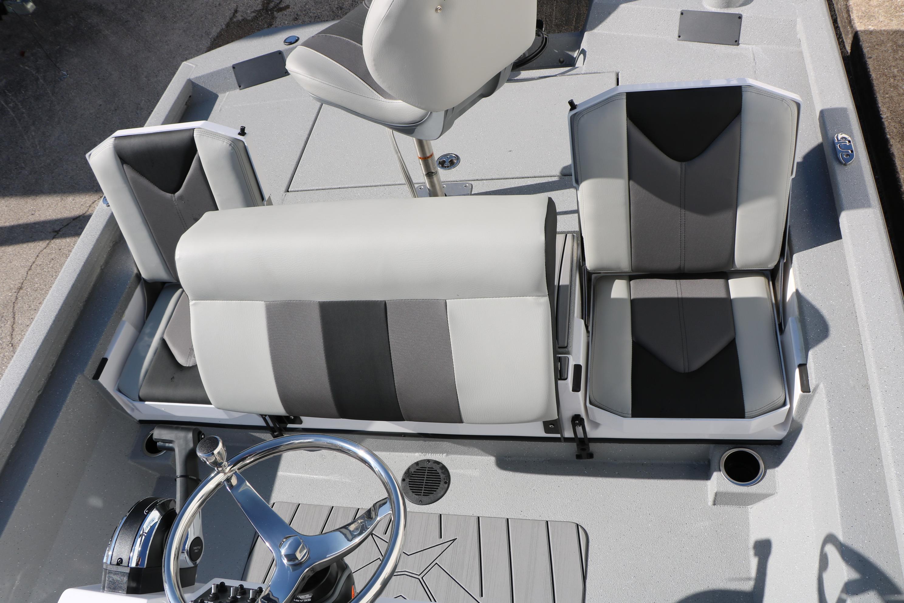 2026 Vexus ACX2000 boat interior with gray and black seating and steering wheel.