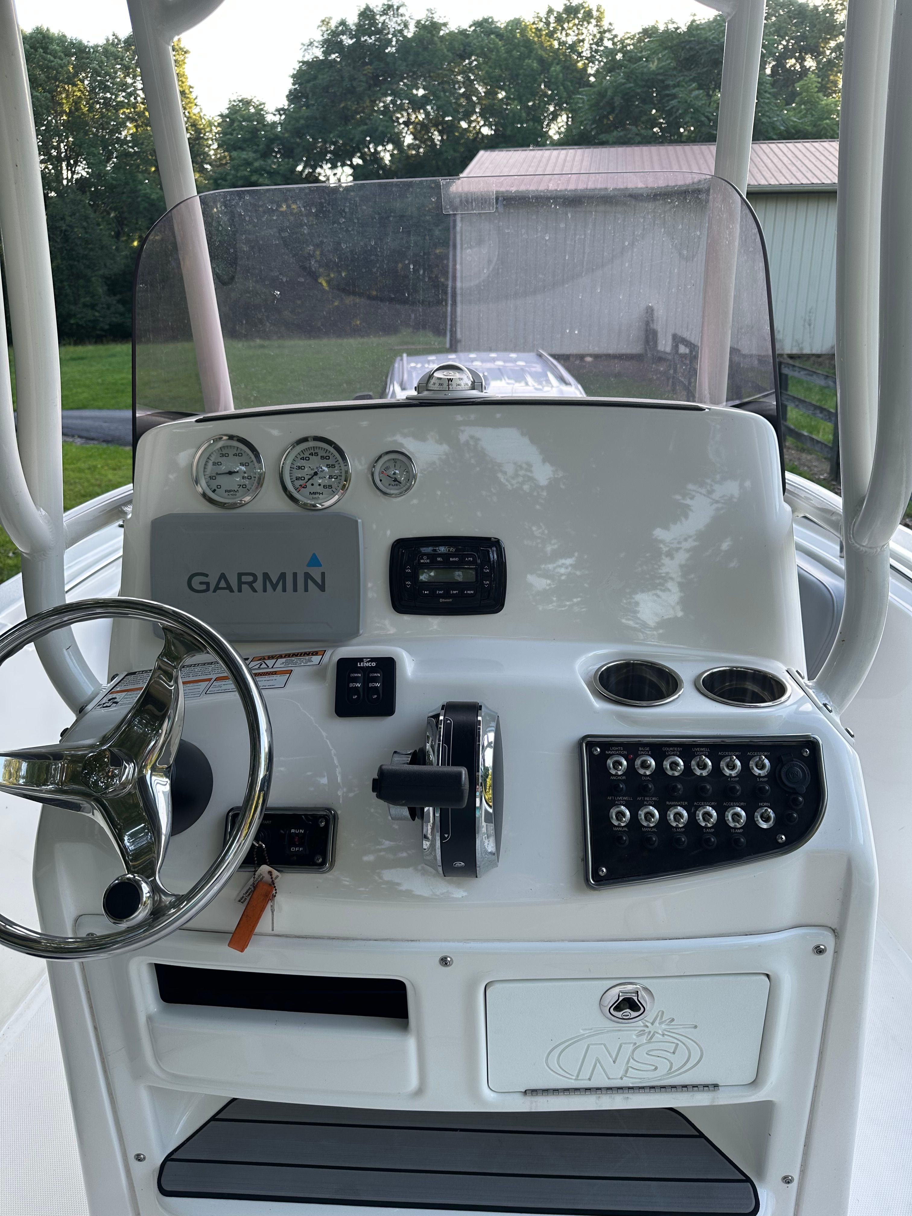 The image shows the helm of a 2022 NauticStar 2102 Legacy boat.