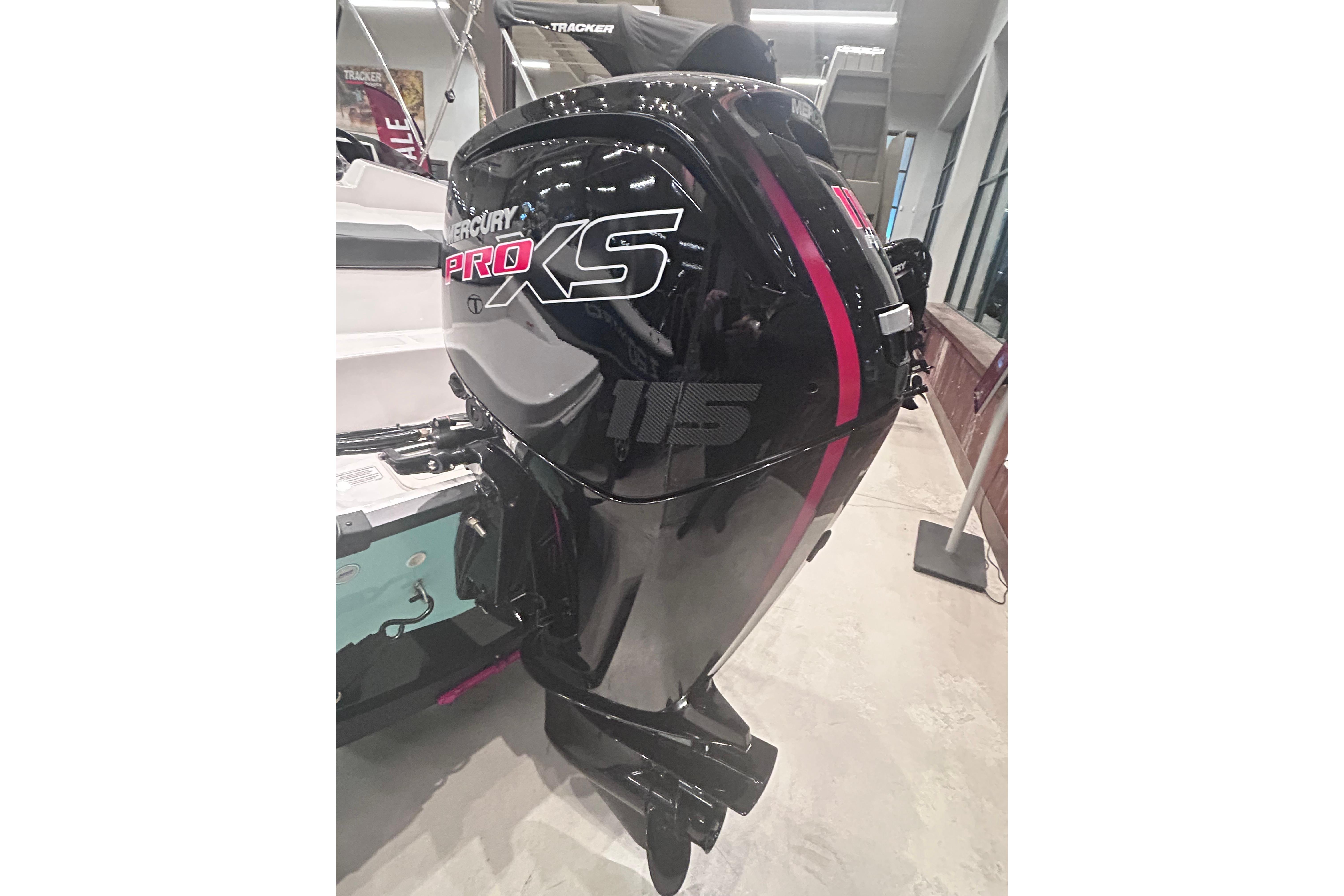 2026 Tahoe T18 with Mercury Pro XS outboard motor in showroom.