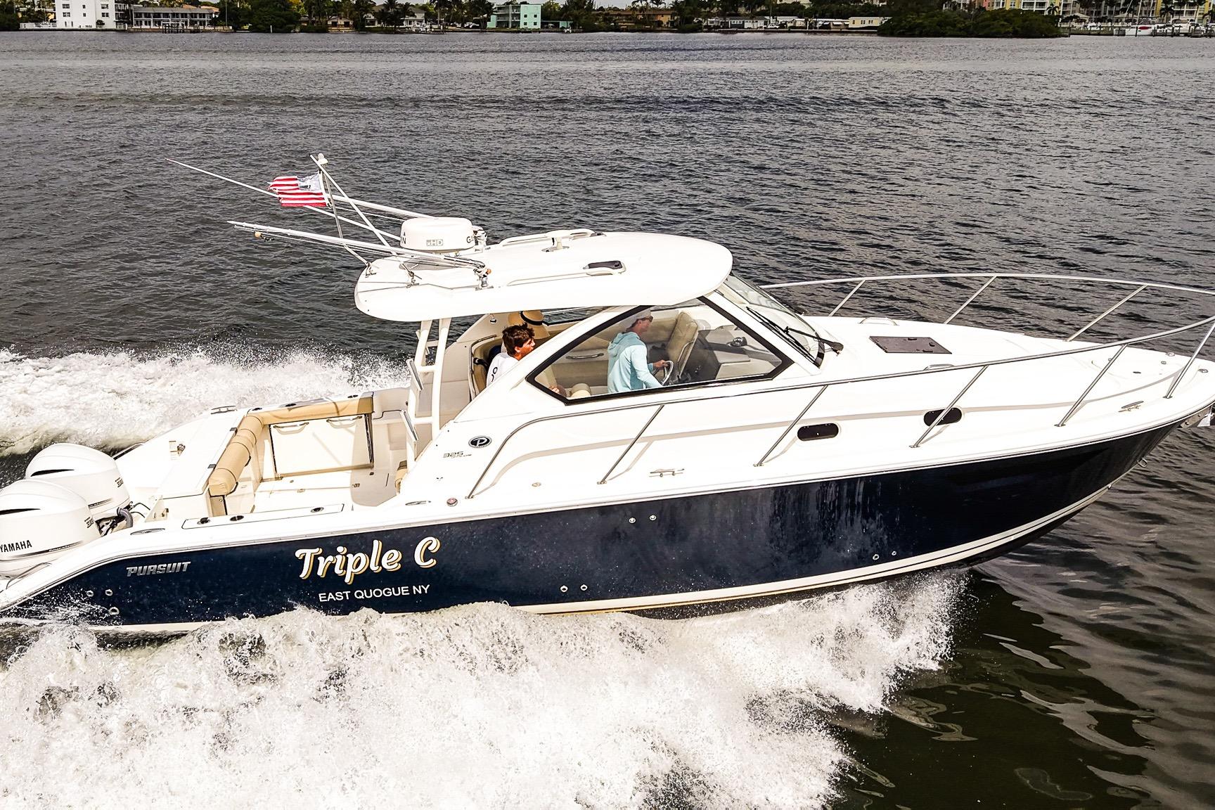 2020 Pursuit OS 325 Offshore boat cruising on water, named "Triple C."