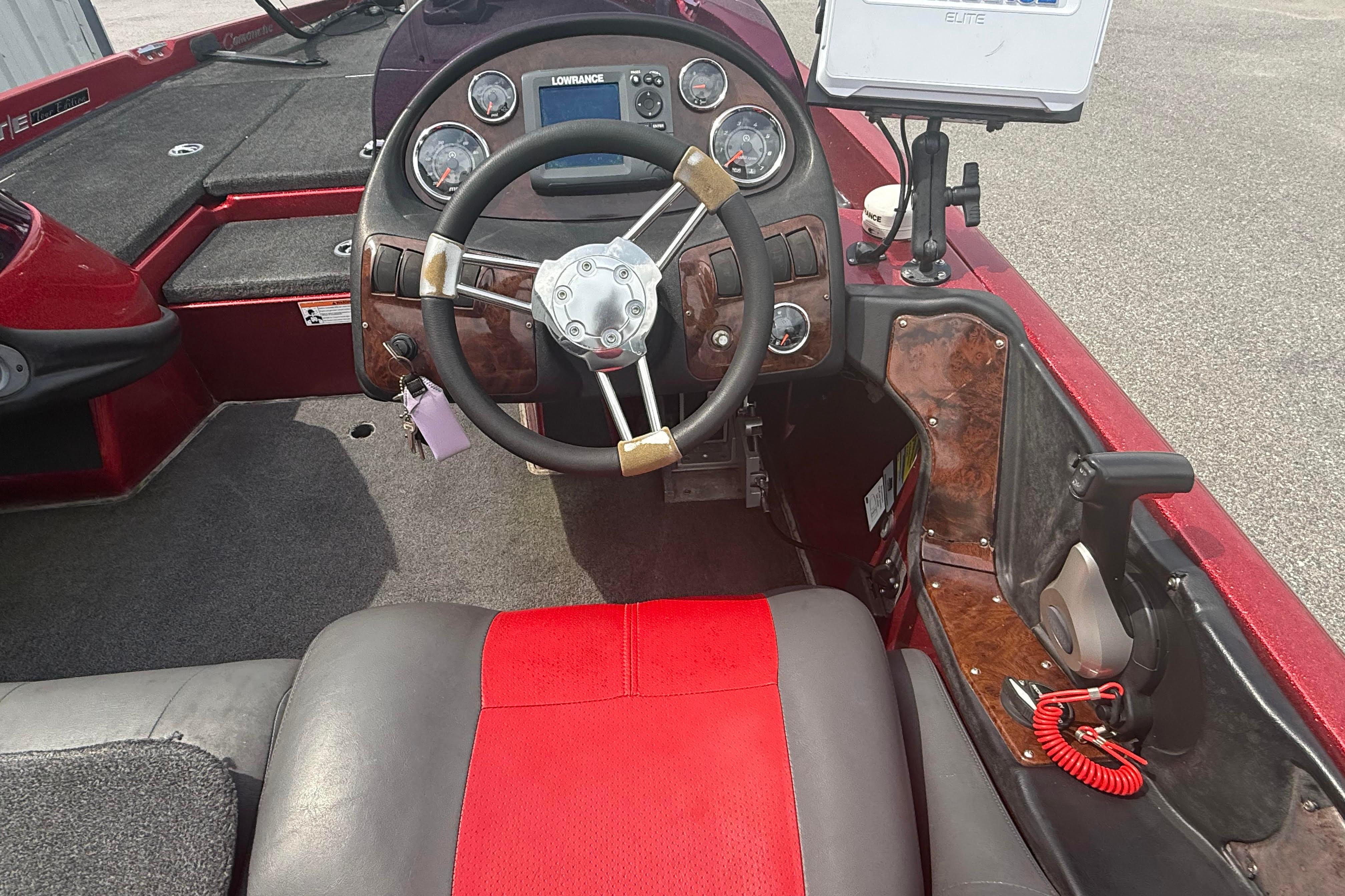 Interior of a 2007 Ranger 519 VX boat with steering wheel and dashboard controls.