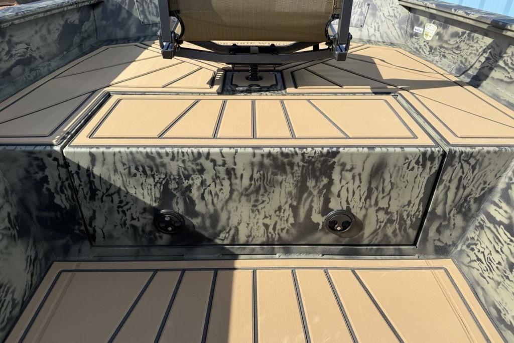 2026 Tracker Grizzly 1650 T Prairie Wings Edition boat interior with camo design and seating.