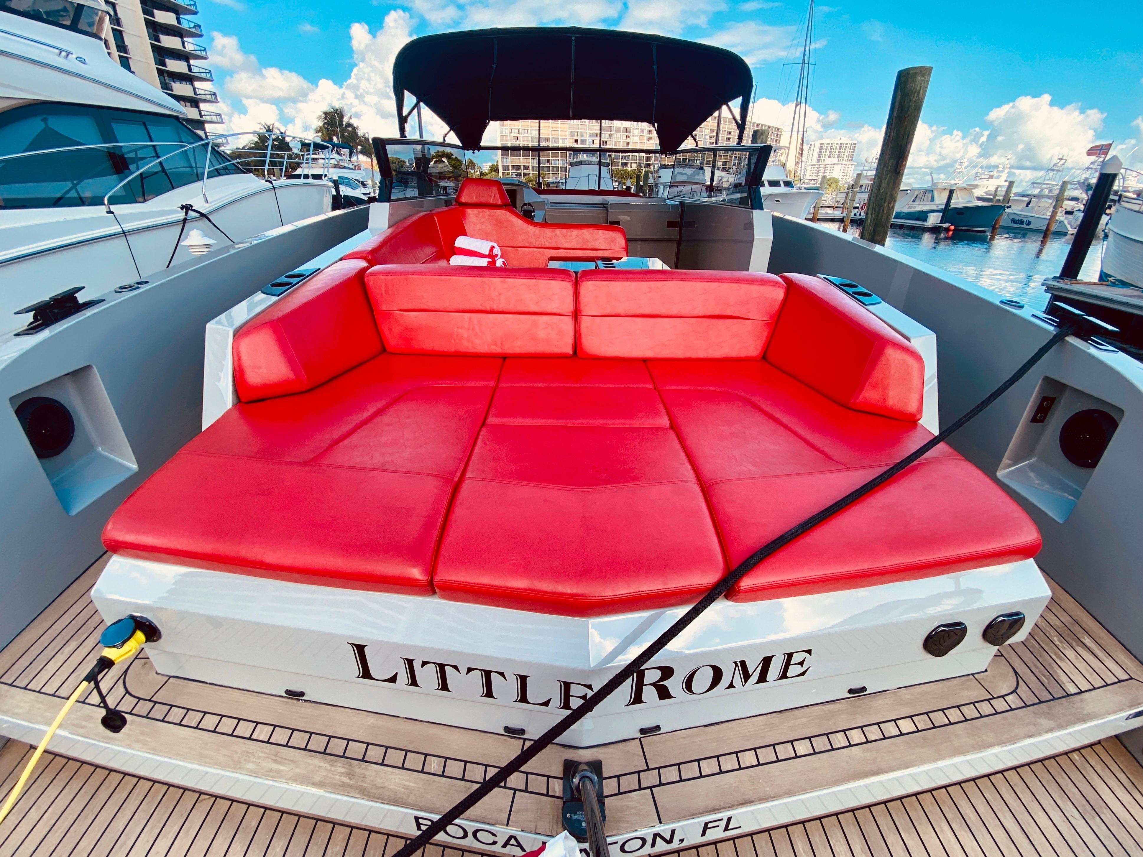 Vanquish VQ45 2020 yacht with red seating, docked in Boca Raton, Florida.